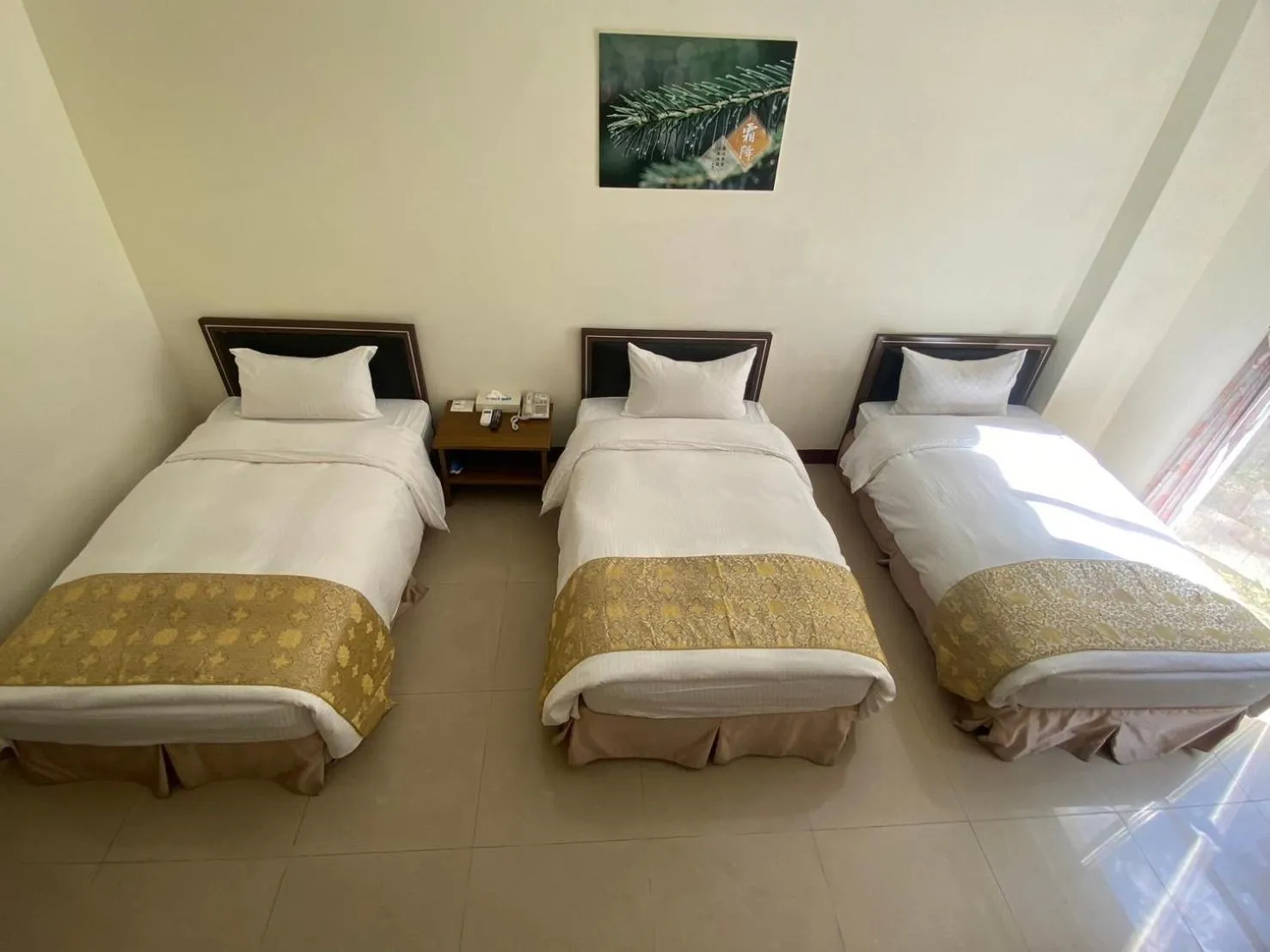 Bed in Zen and Pine Resort