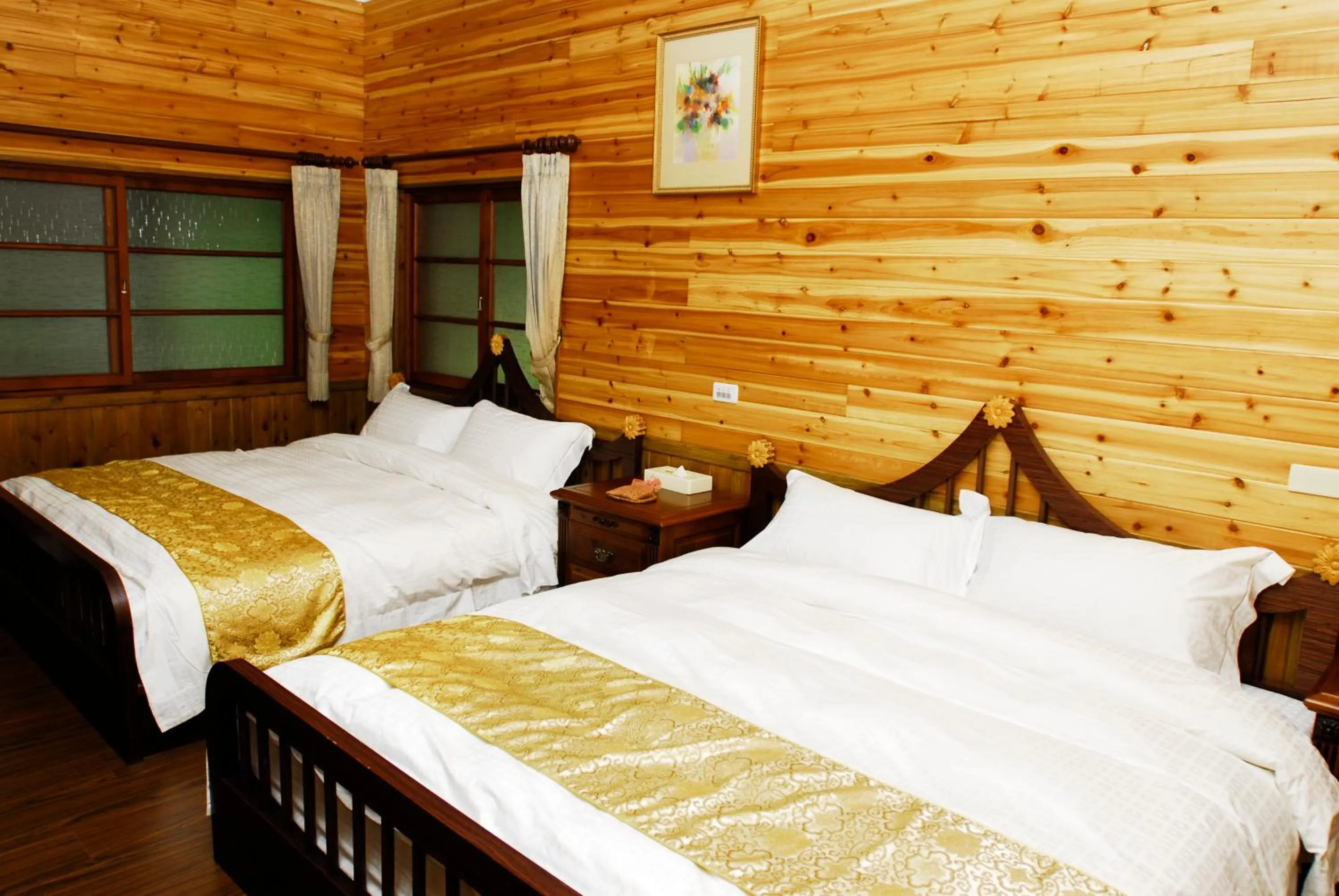 Bed in Zen and Pine Resort