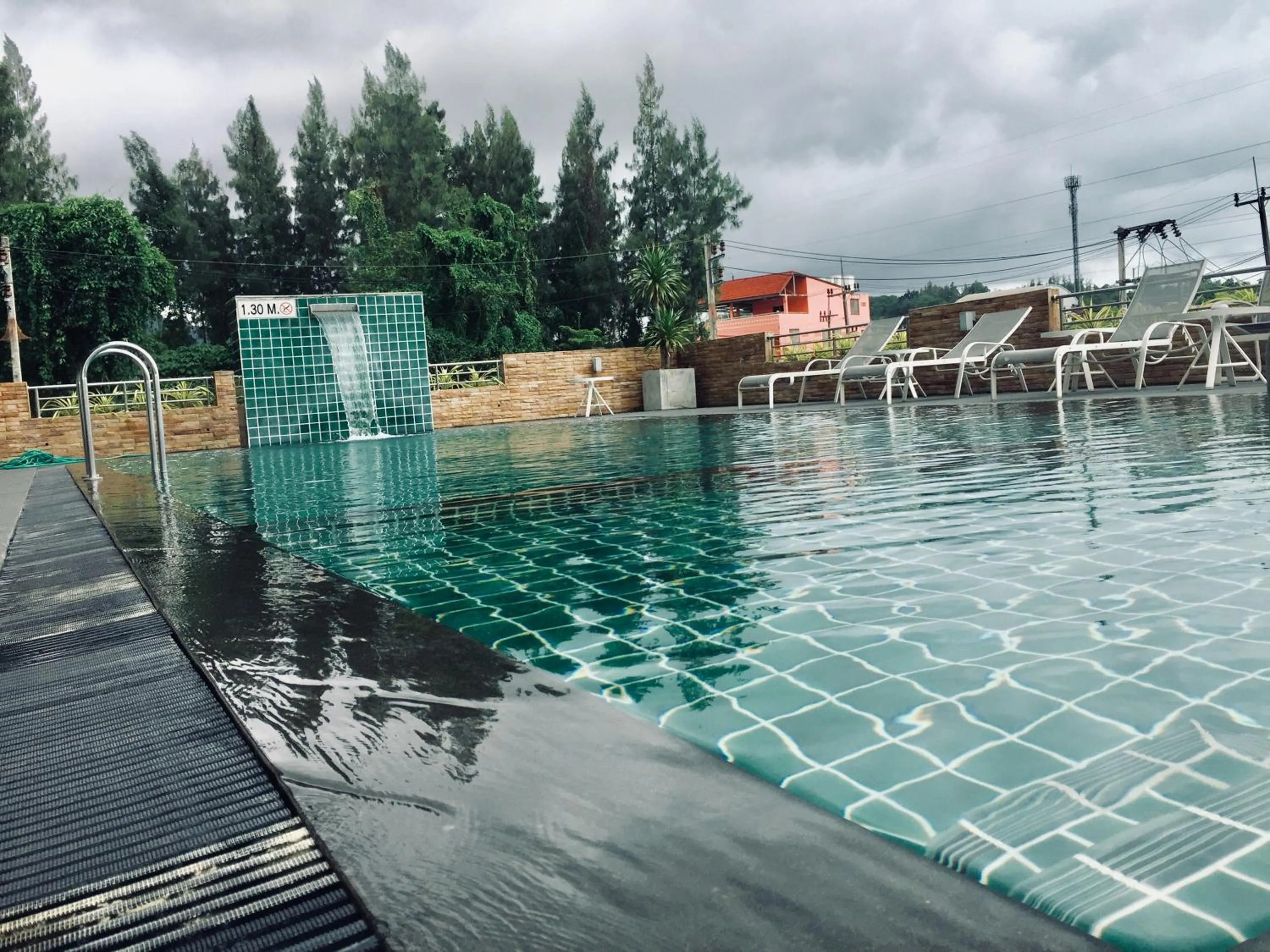 Swimming pool in CA Hotel and Residence Phuket - SHA Extra Plus