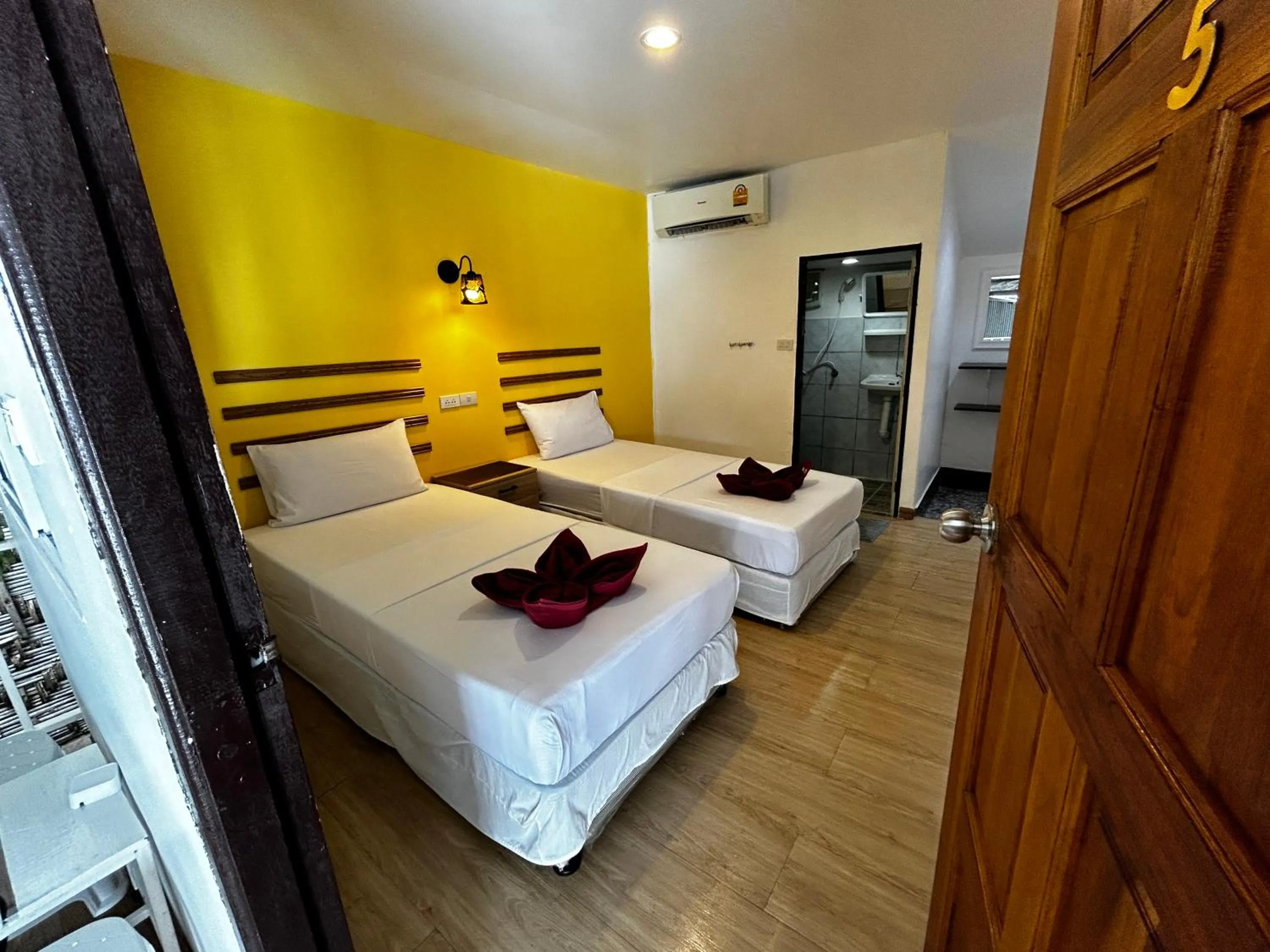 Bed in Coco's Guest House