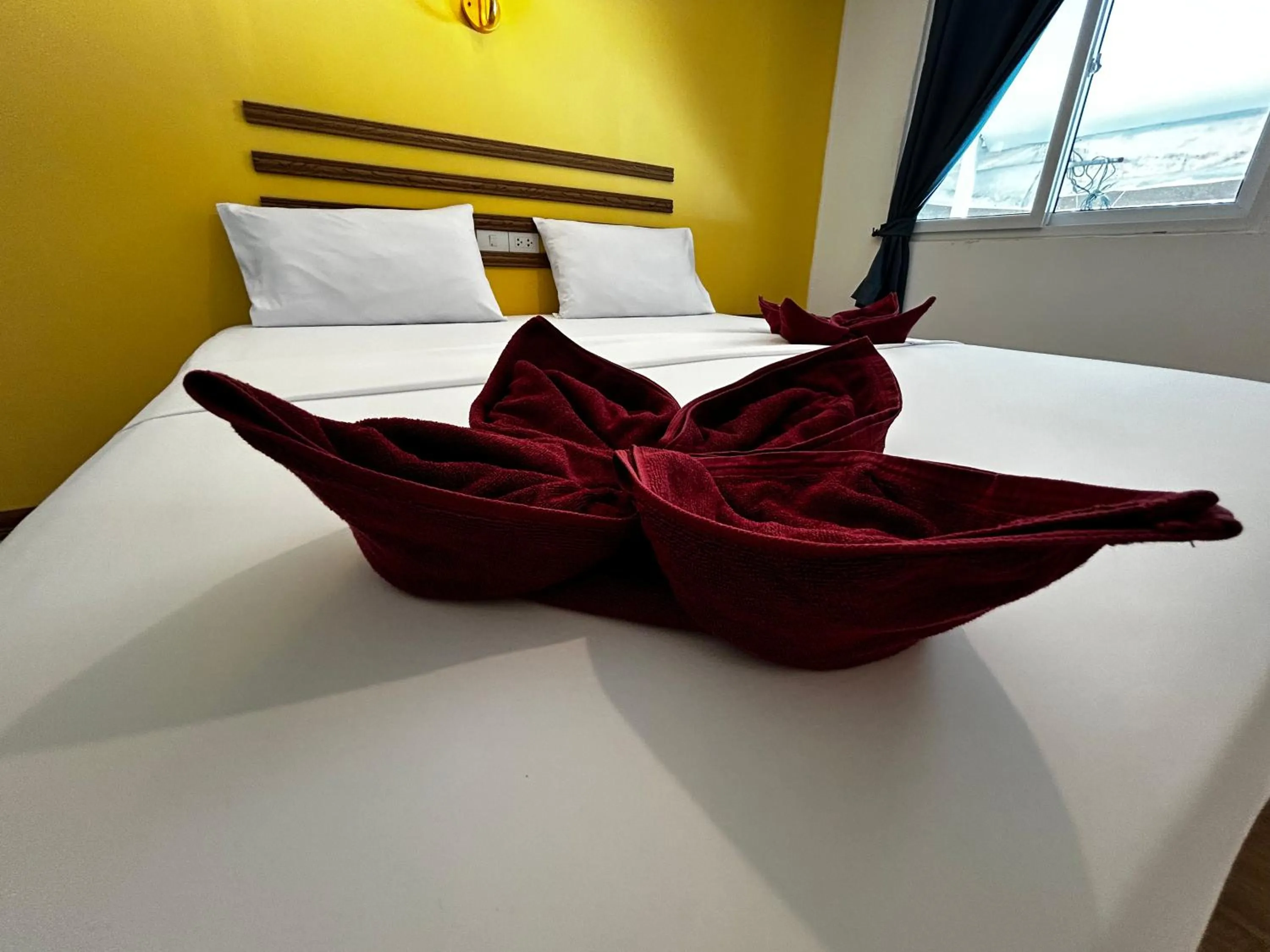 Bed in Coco's Guest House