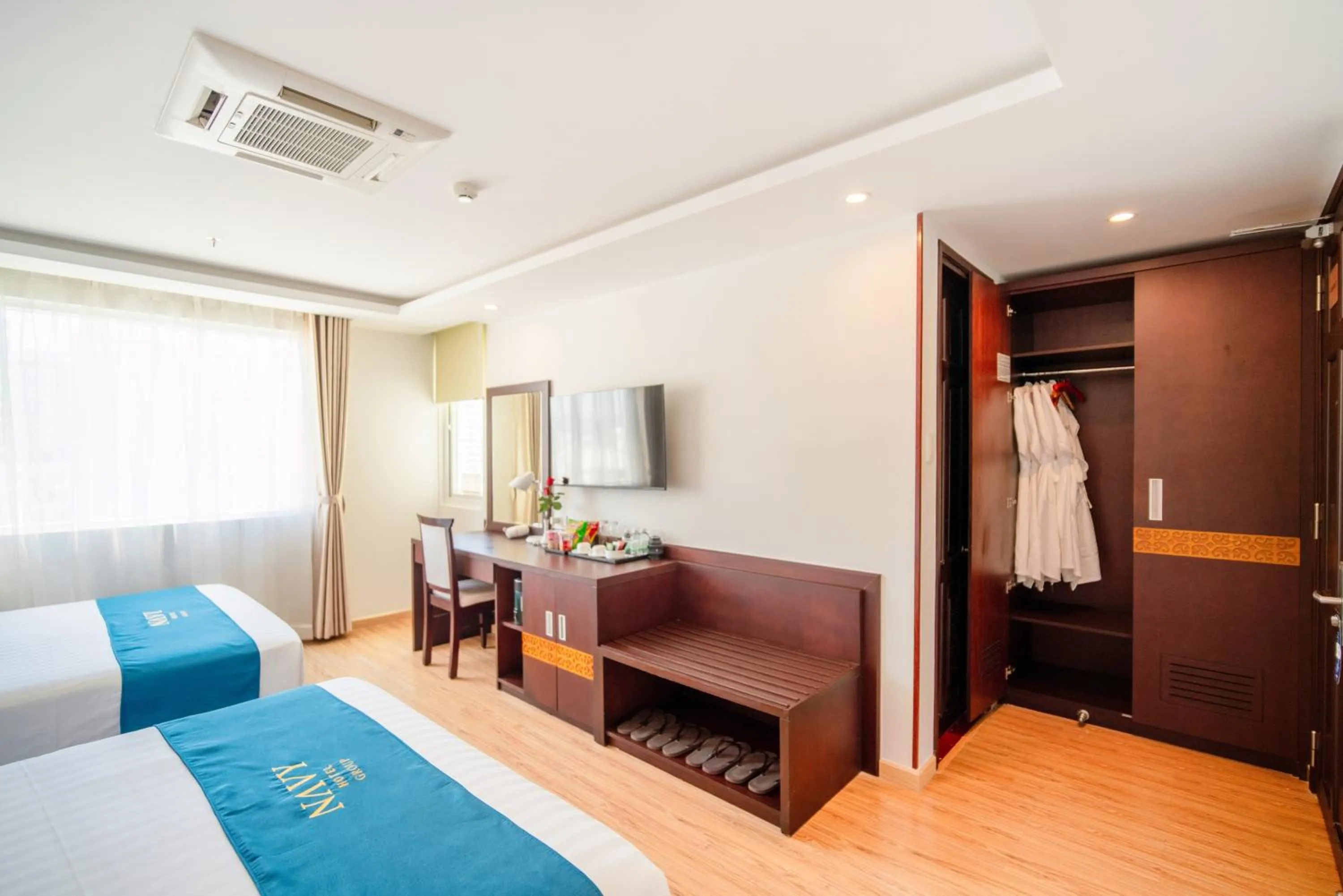 Seating area, Bed in Galliot Hotel Nha Trang