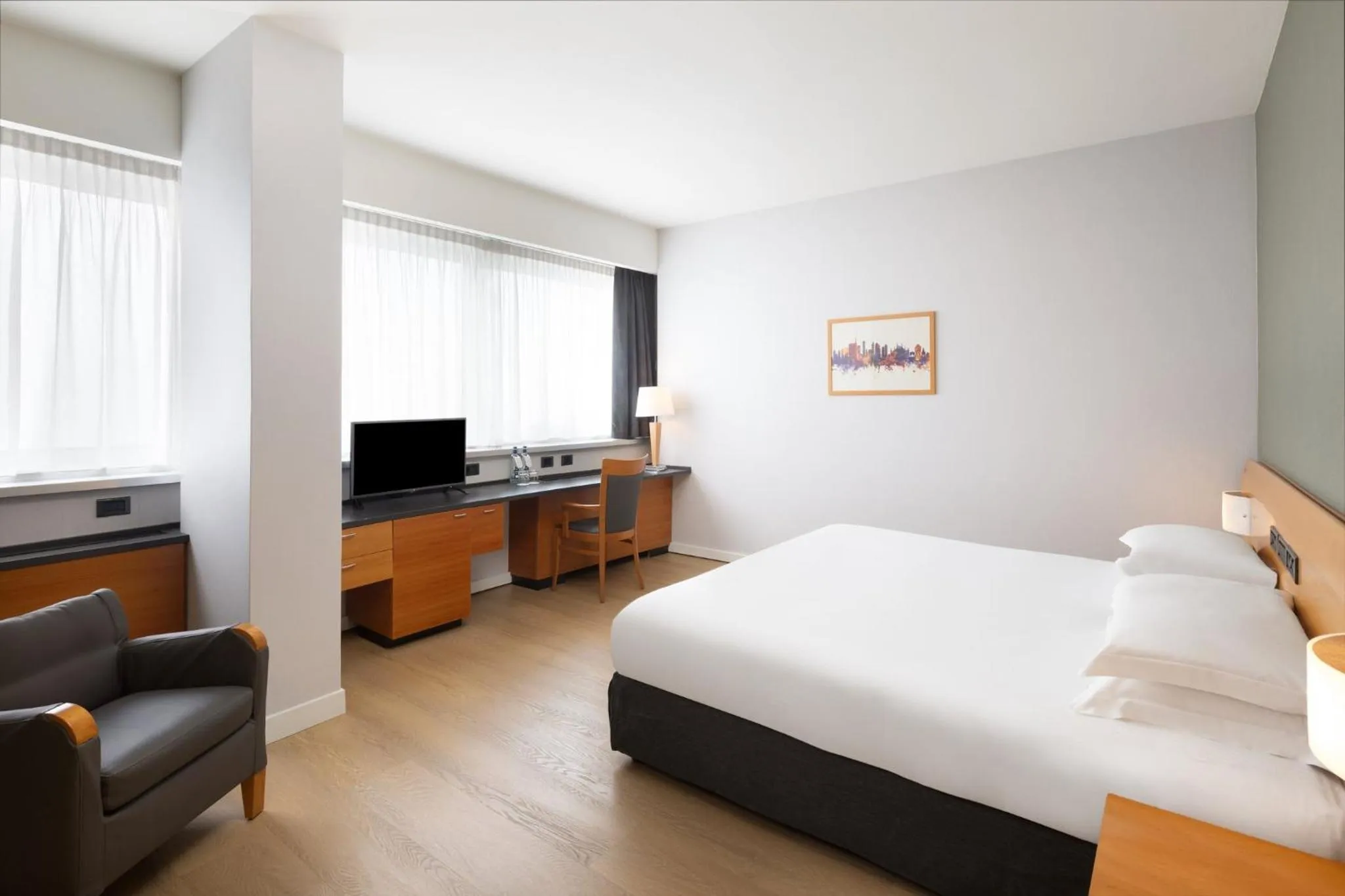 Photo of the whole room, Bed in Crowne Plaza Milan Linate by IHG