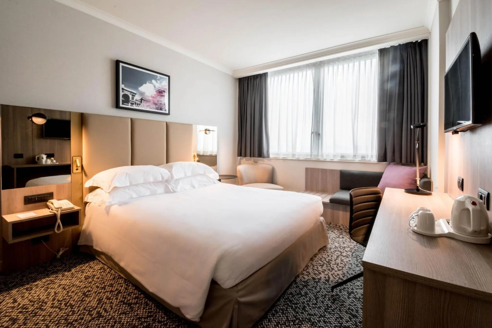 Photo of the whole room, Bed in Crowne Plaza Milan Linate by IHG