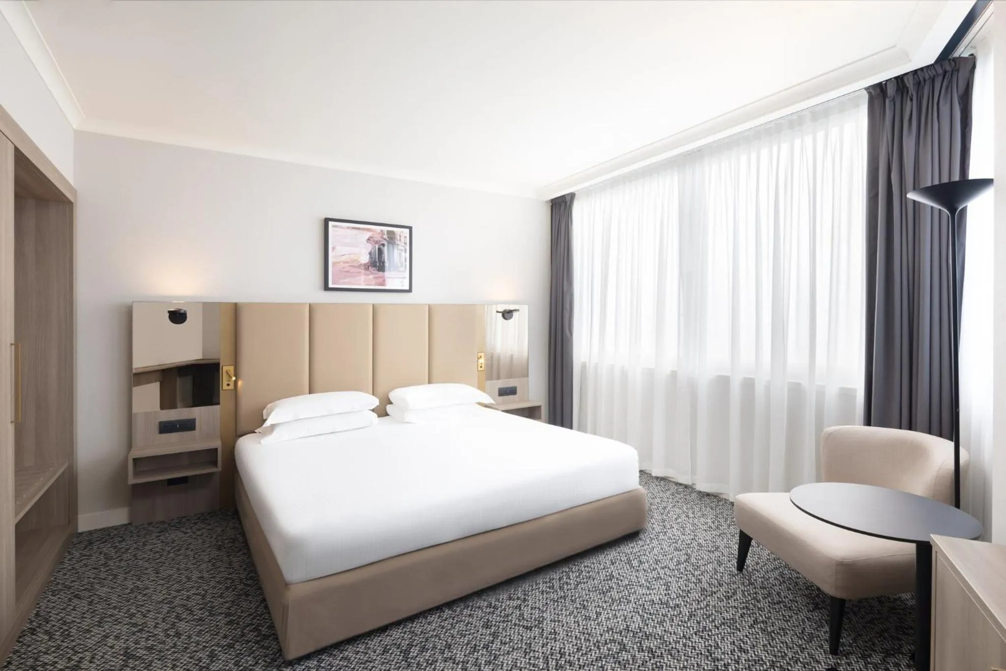 Photo of the whole room, Bed in Crowne Plaza Milan Linate by IHG