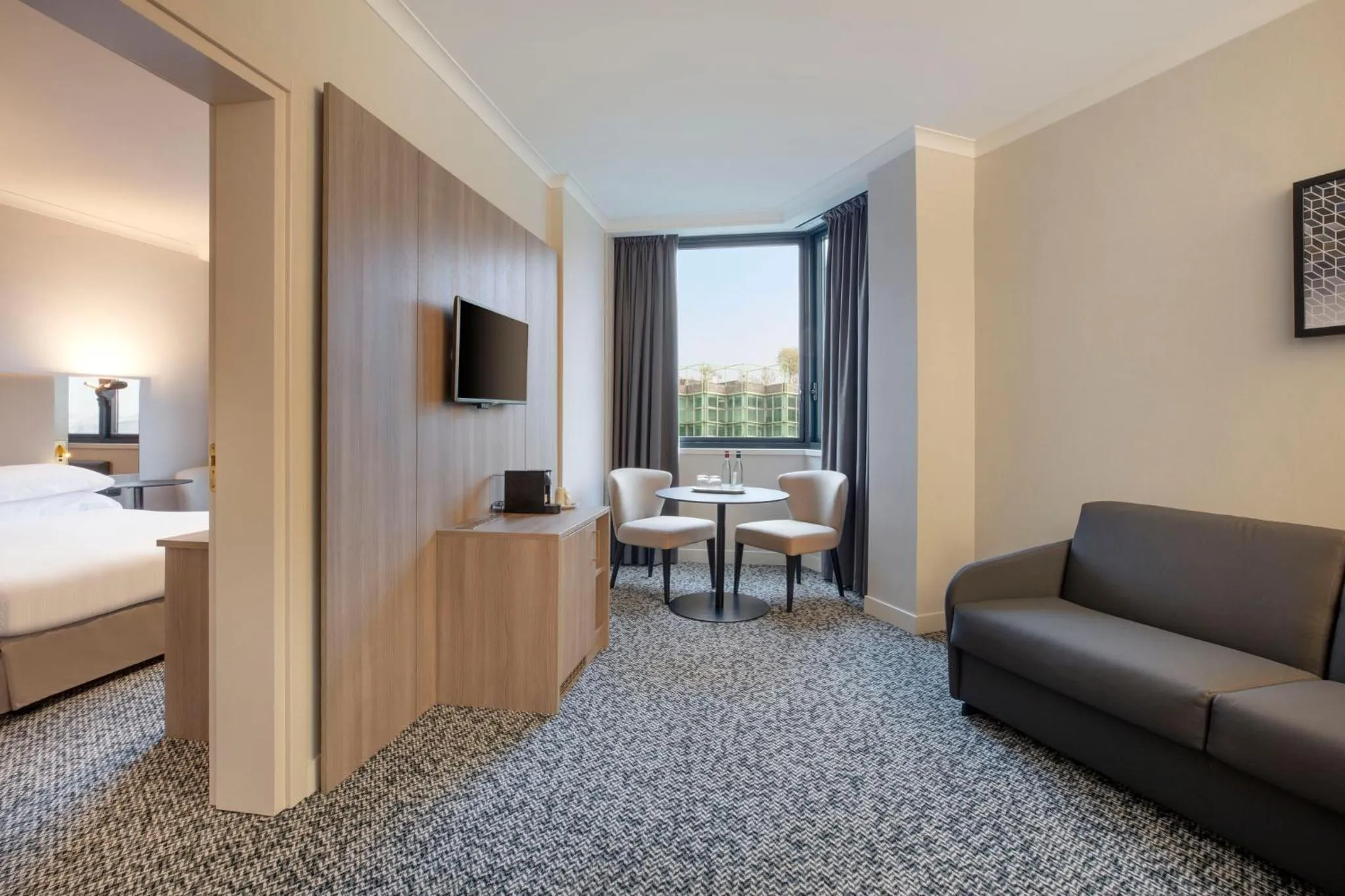 Photo of the whole room, Bed in Crowne Plaza Milan Linate by IHG