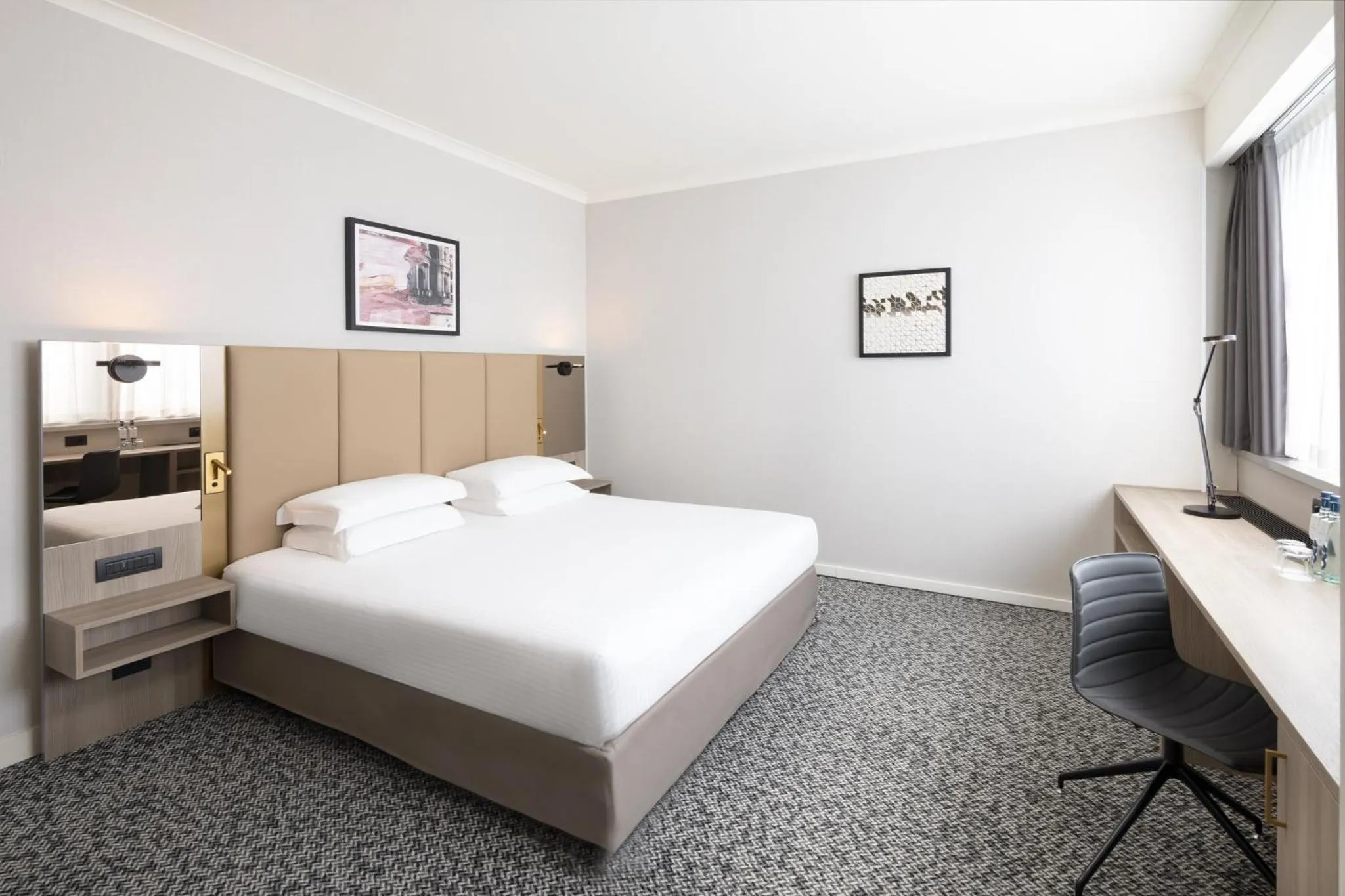 Photo of the whole room, Bed in Crowne Plaza Milan Linate by IHG