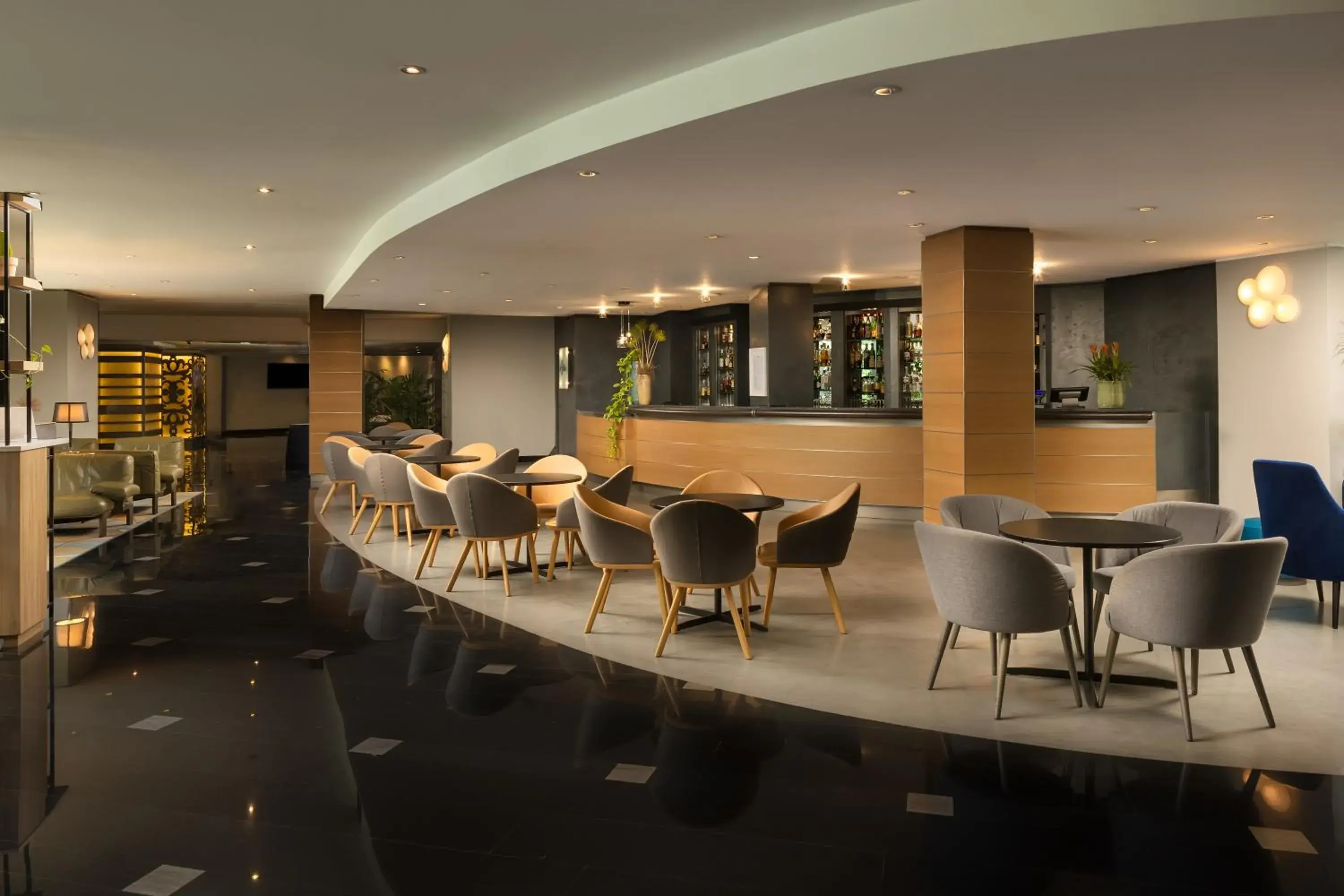 Lounge or bar in Crowne Plaza Milan Linate by IHG Lounge or bar in Crowne Plaza Milan Linate by IHG