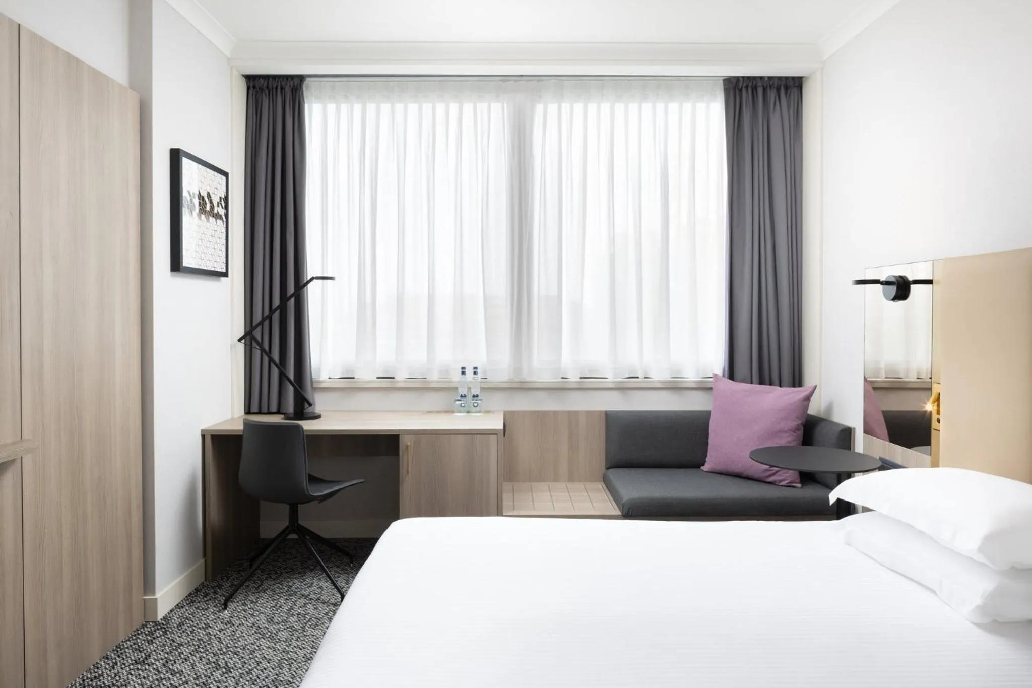 Photo of the whole room, Bed in Crowne Plaza Milan Linate by IHG