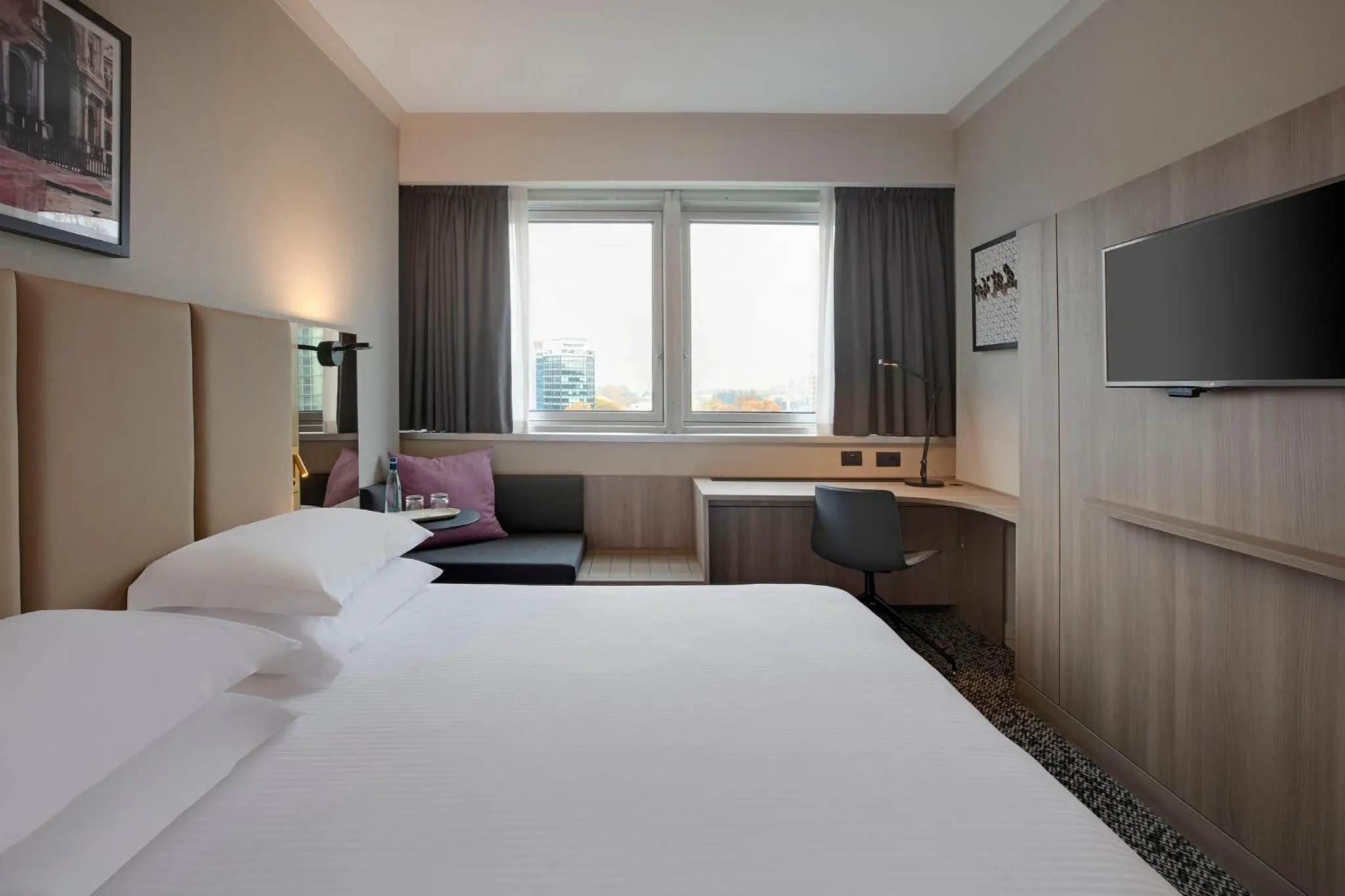 Photo of the whole room, Bed in Crowne Plaza Milan Linate by IHG