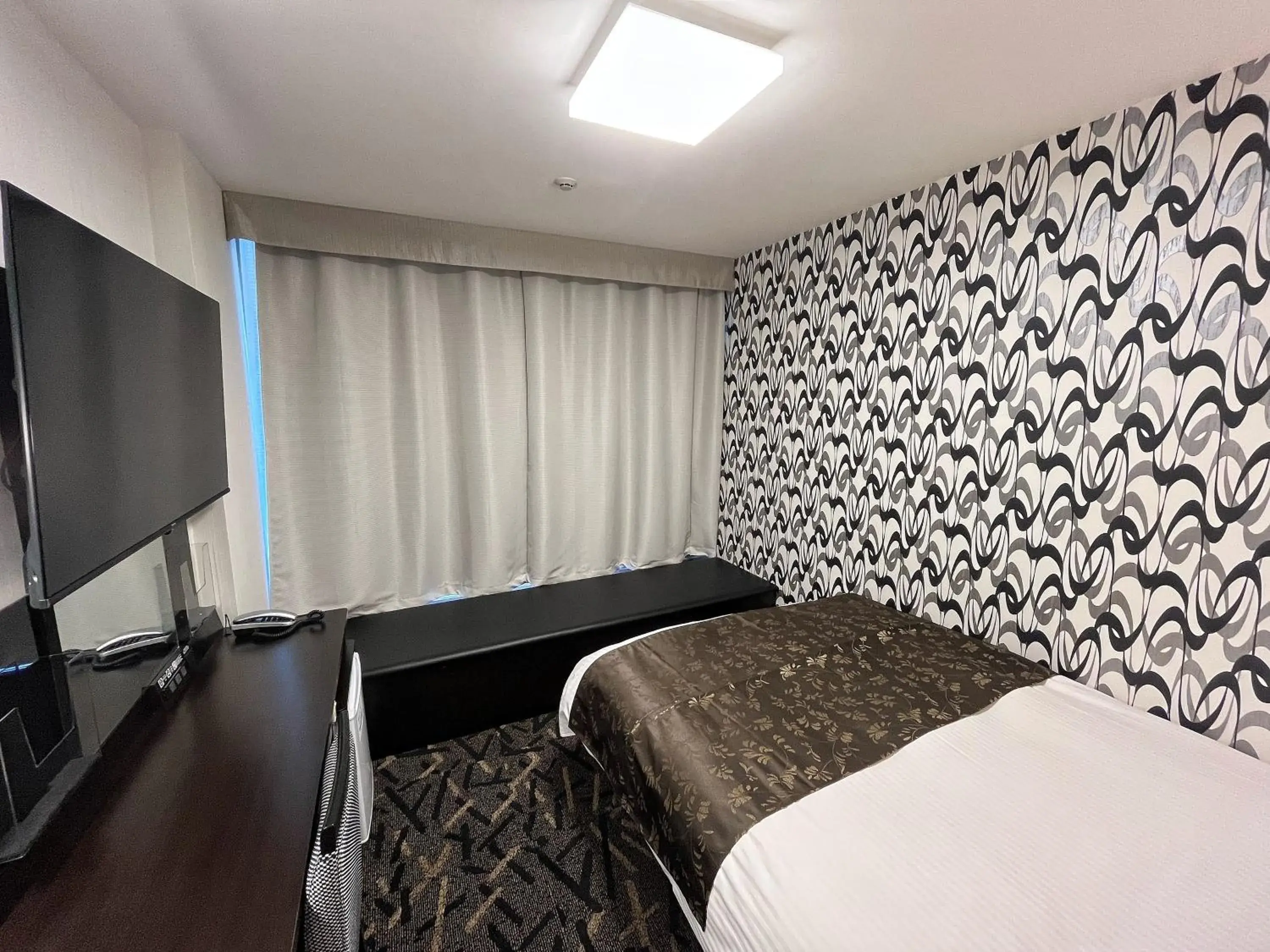 Bed in APA Hotel Kamata Ekimae Bed in APA Hotel Kamata Ekimae