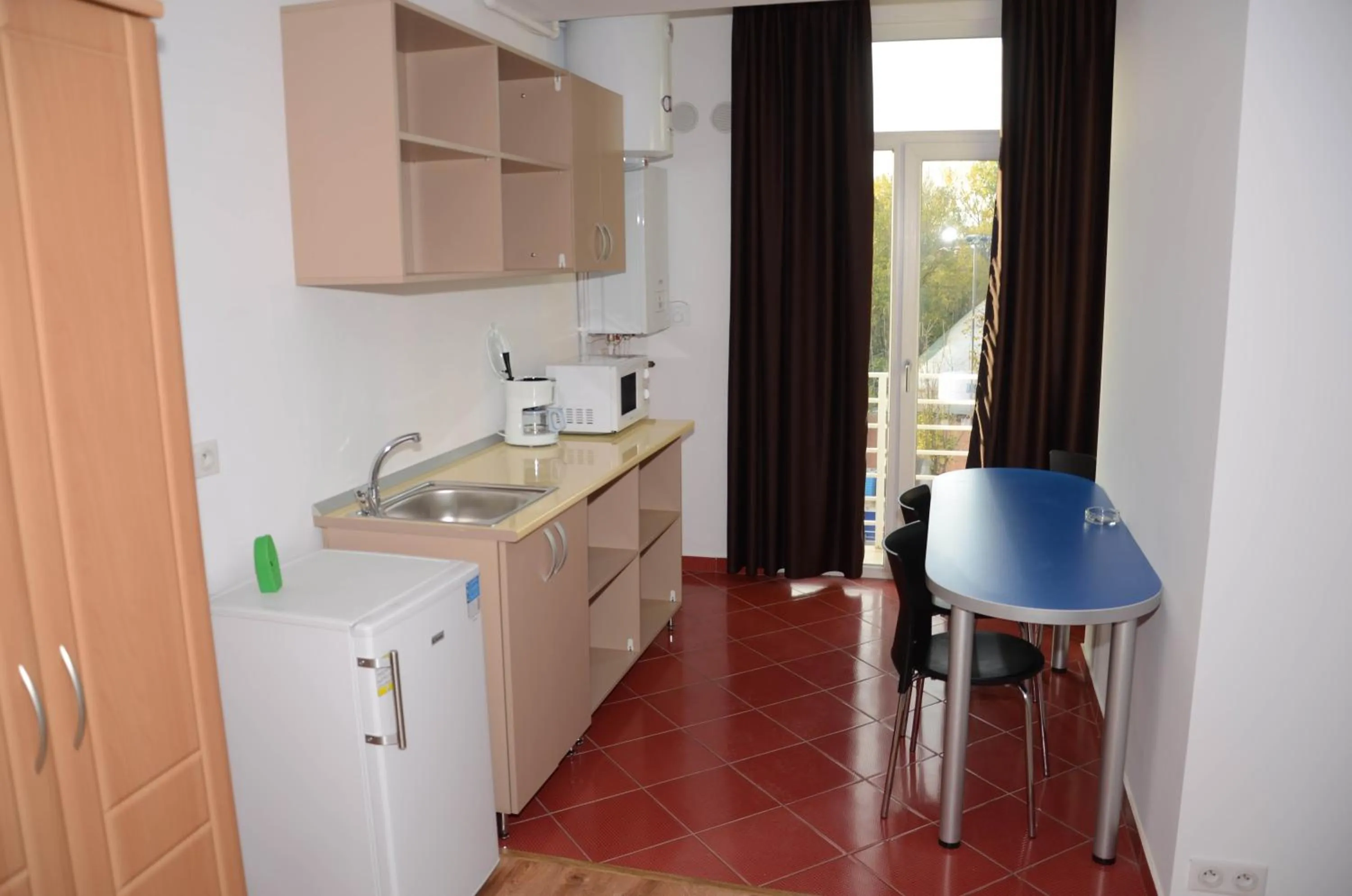 Kitchen or kitchenette in Apart La Cave