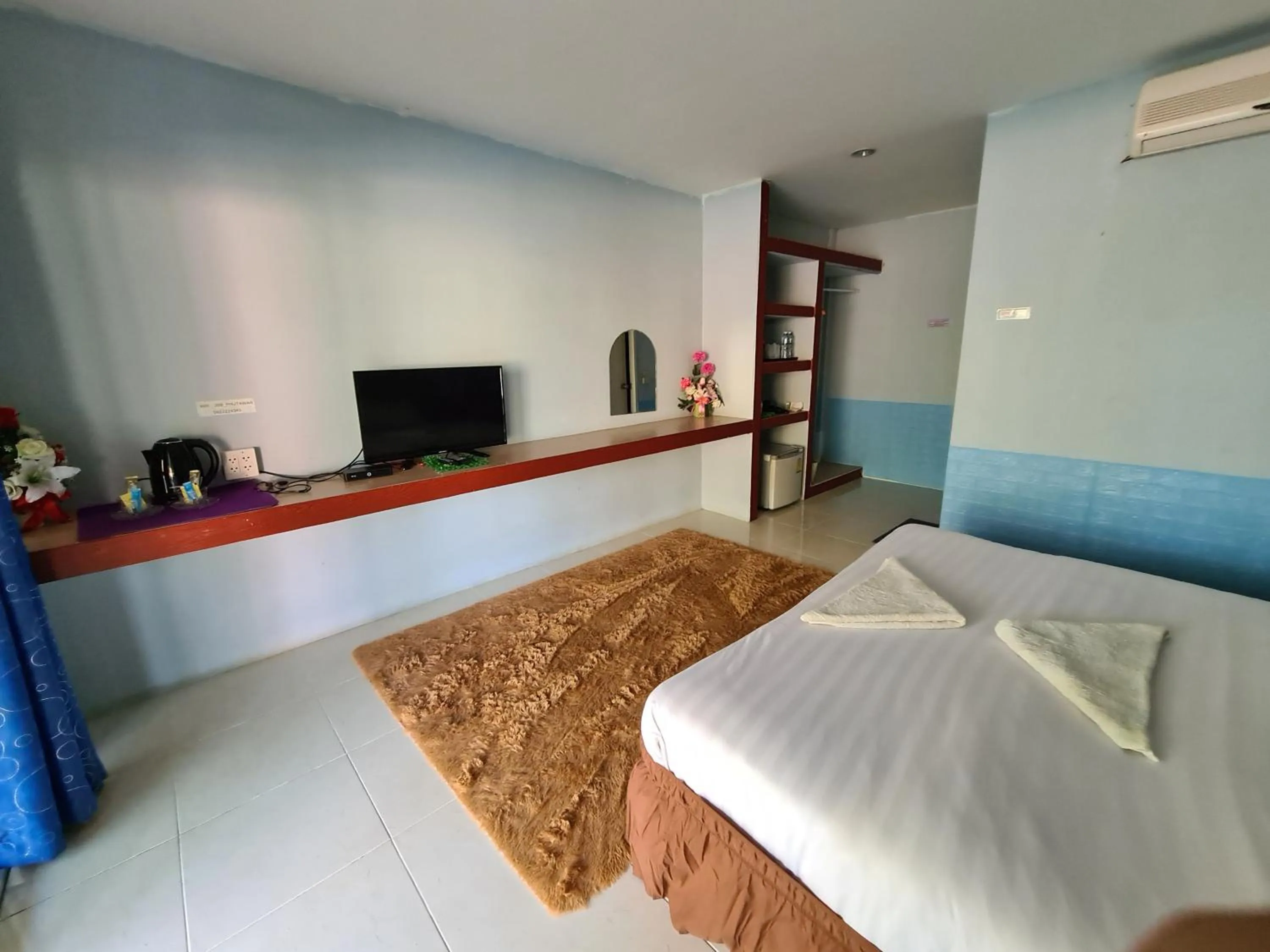 Bed in Phutawan Resort