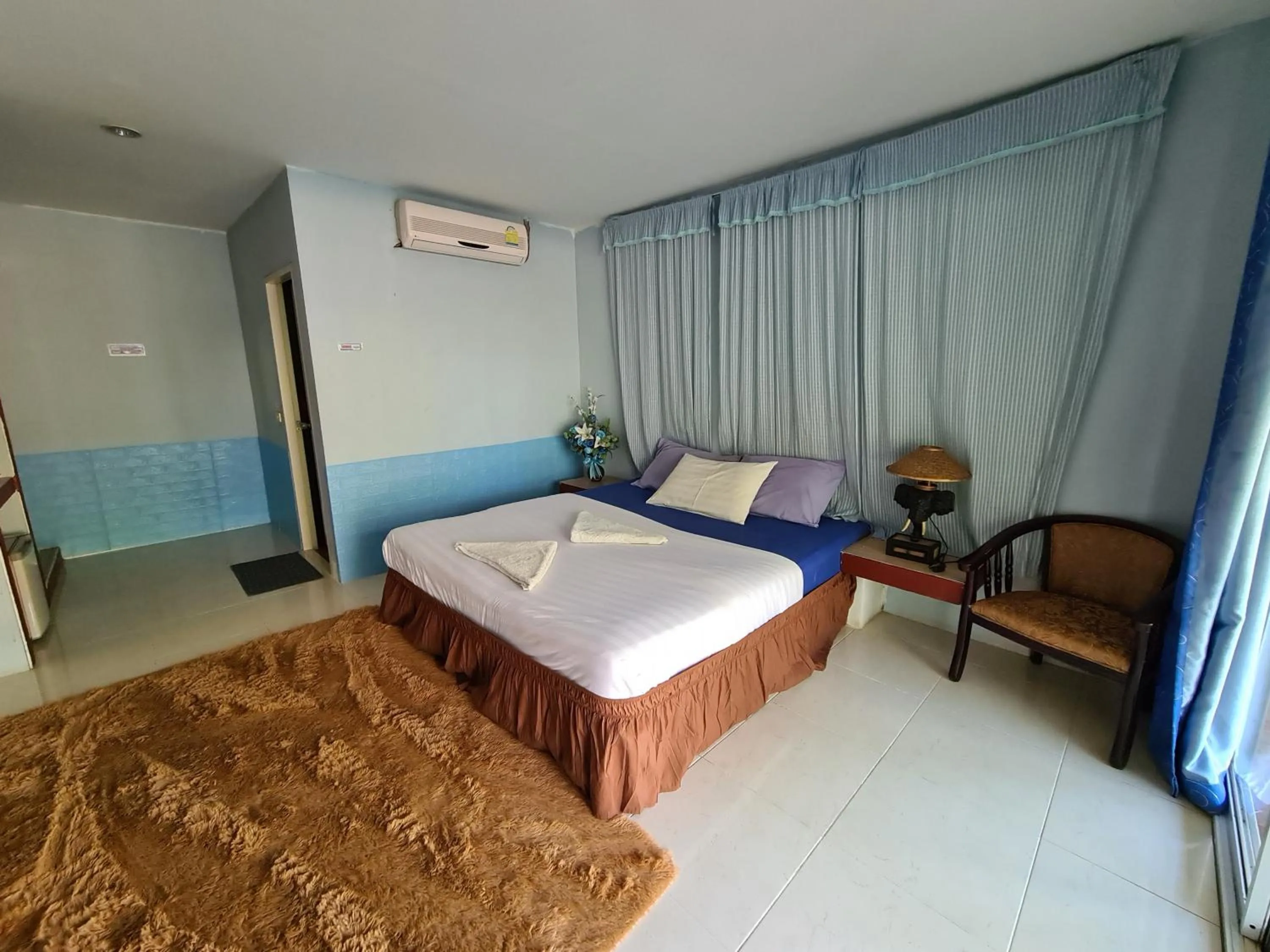 Bed in Phutawan Resort