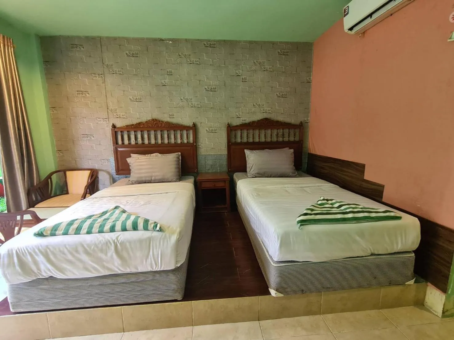 Bed in Phutawan Resort