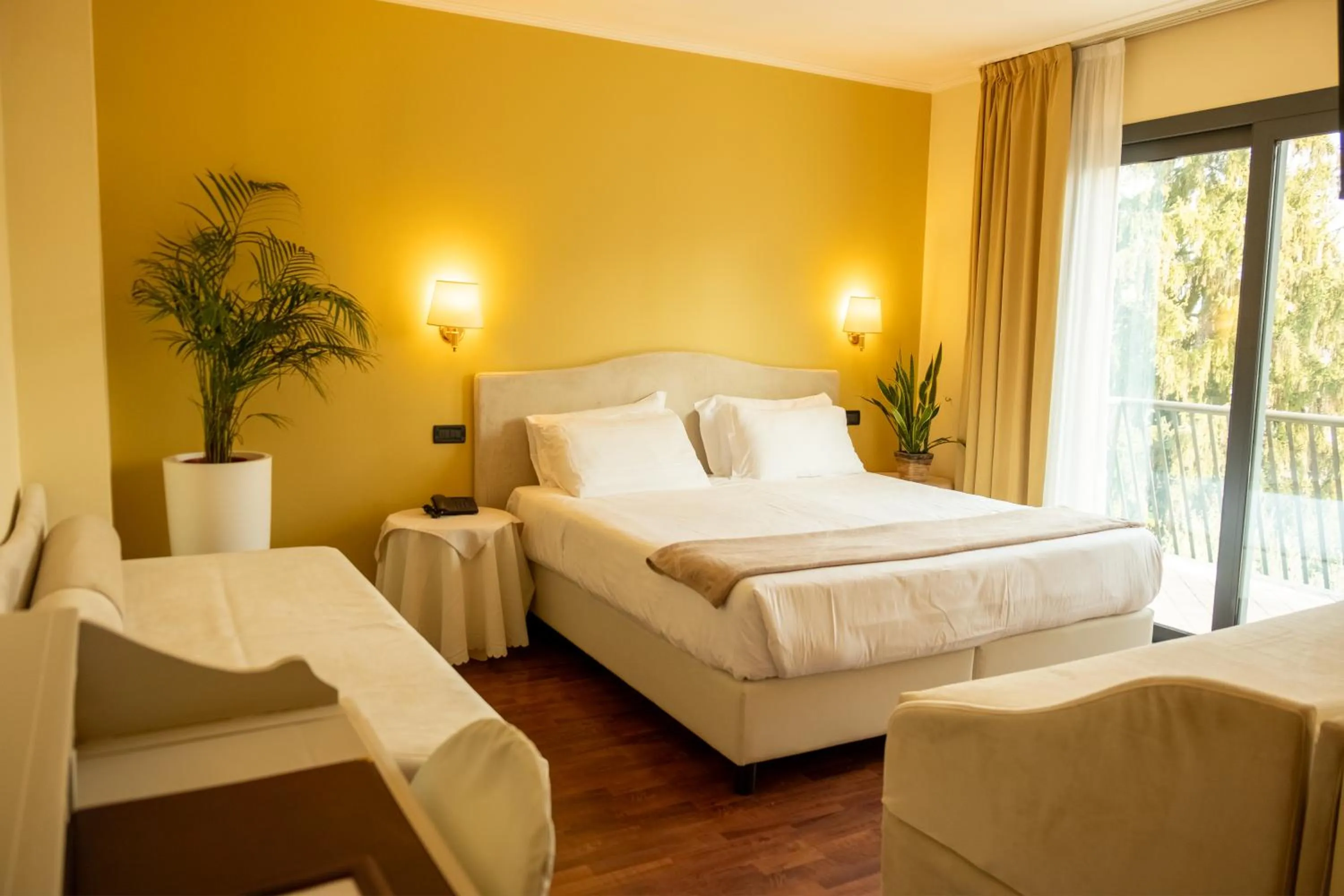 Bed in Admiral Hotel Villa Erme