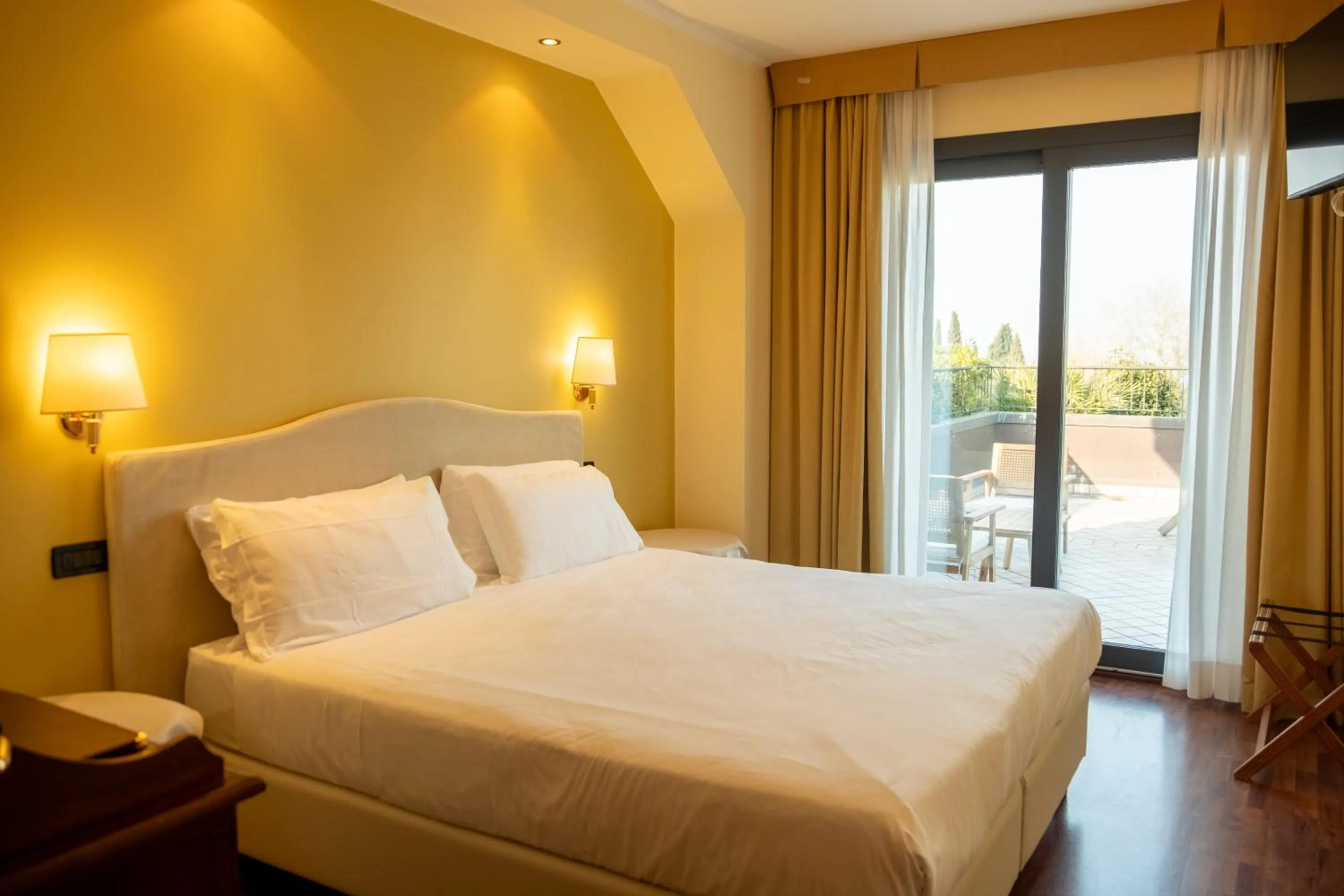 Bed in Admiral Hotel Villa Erme