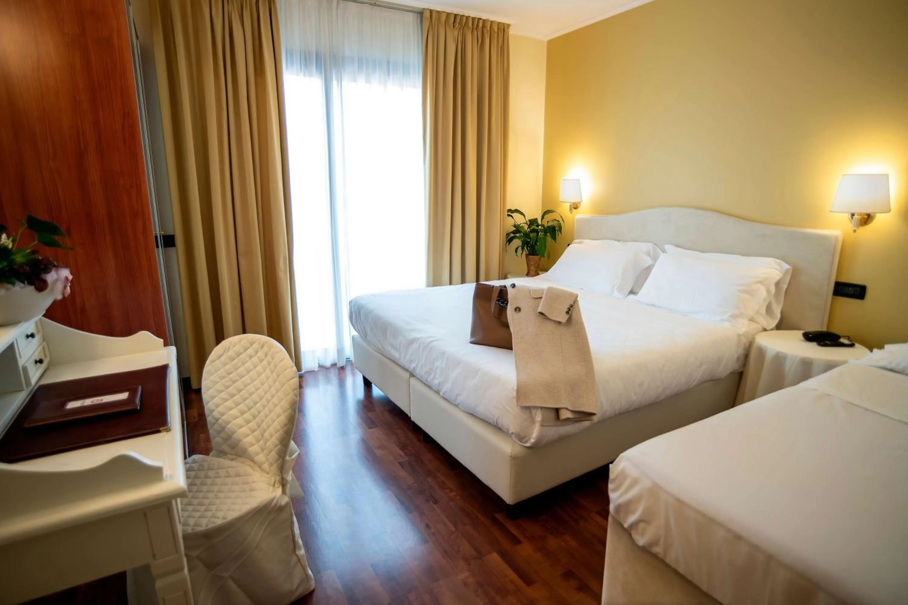 Photo of the whole room, Bed in Admiral Hotel Villa Erme