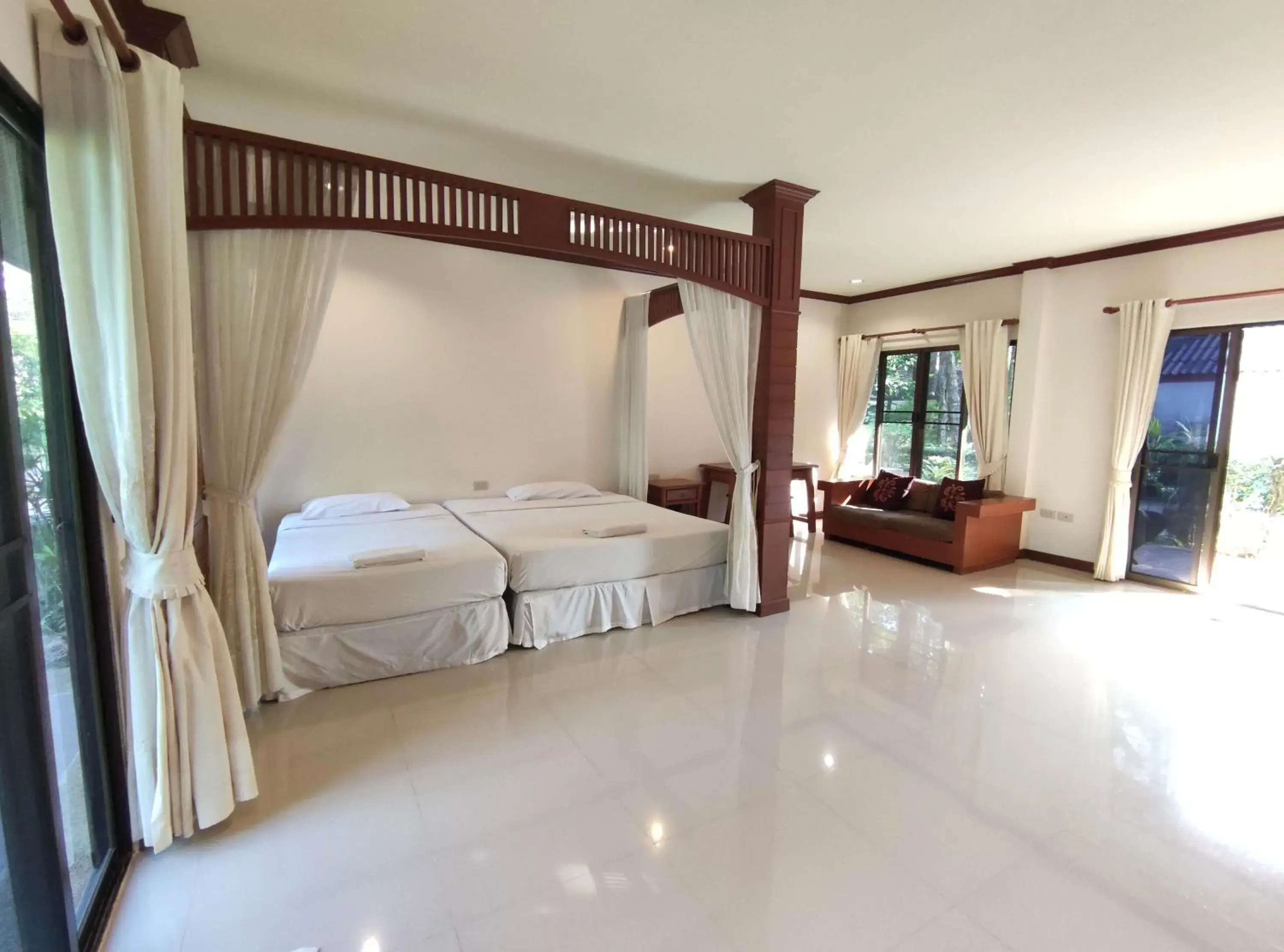 Bed in Thara Cholapruek Resort Bed in Thara Cholapruek Resort