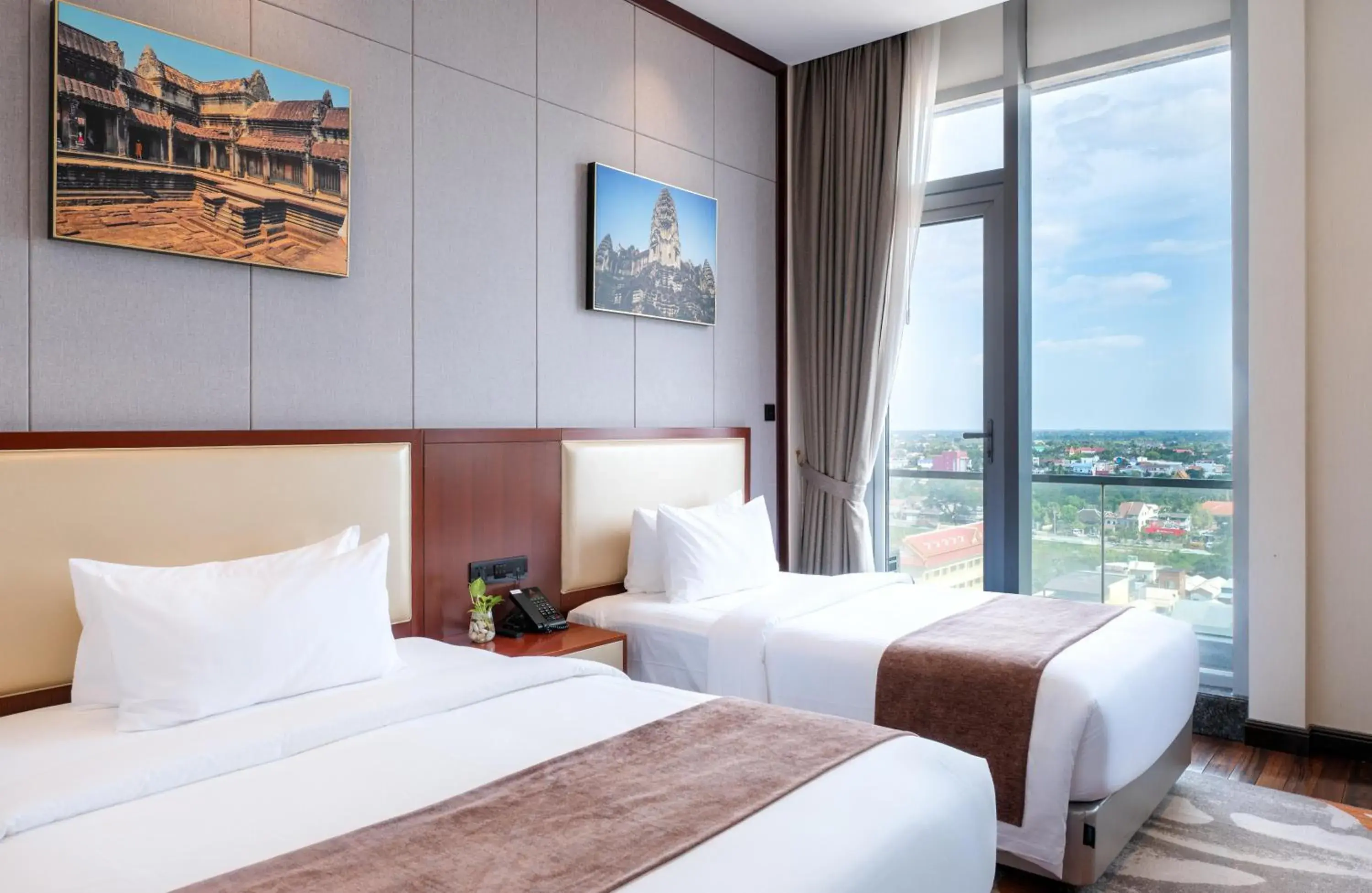 Bed in V V Hotel Battambang Bed in V V Hotel Battambang