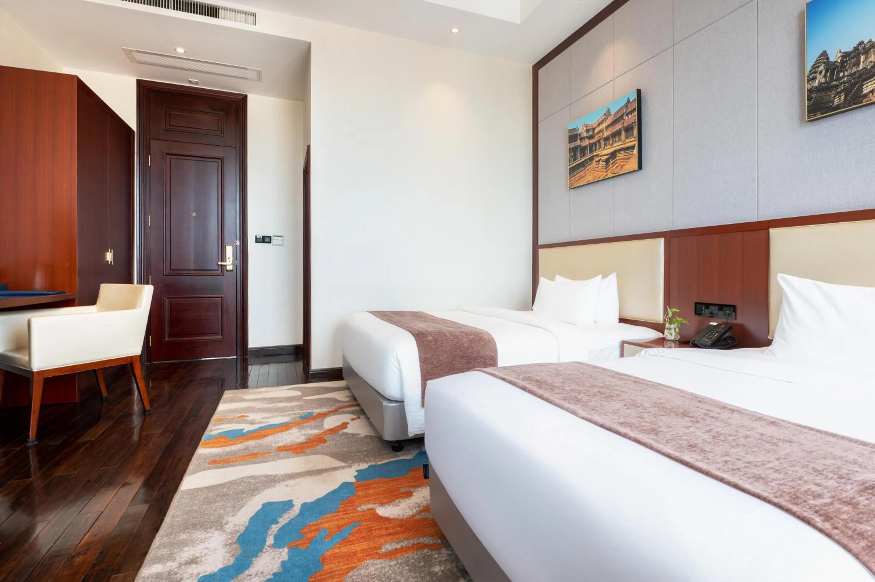 Bed in V V Hotel Battambang