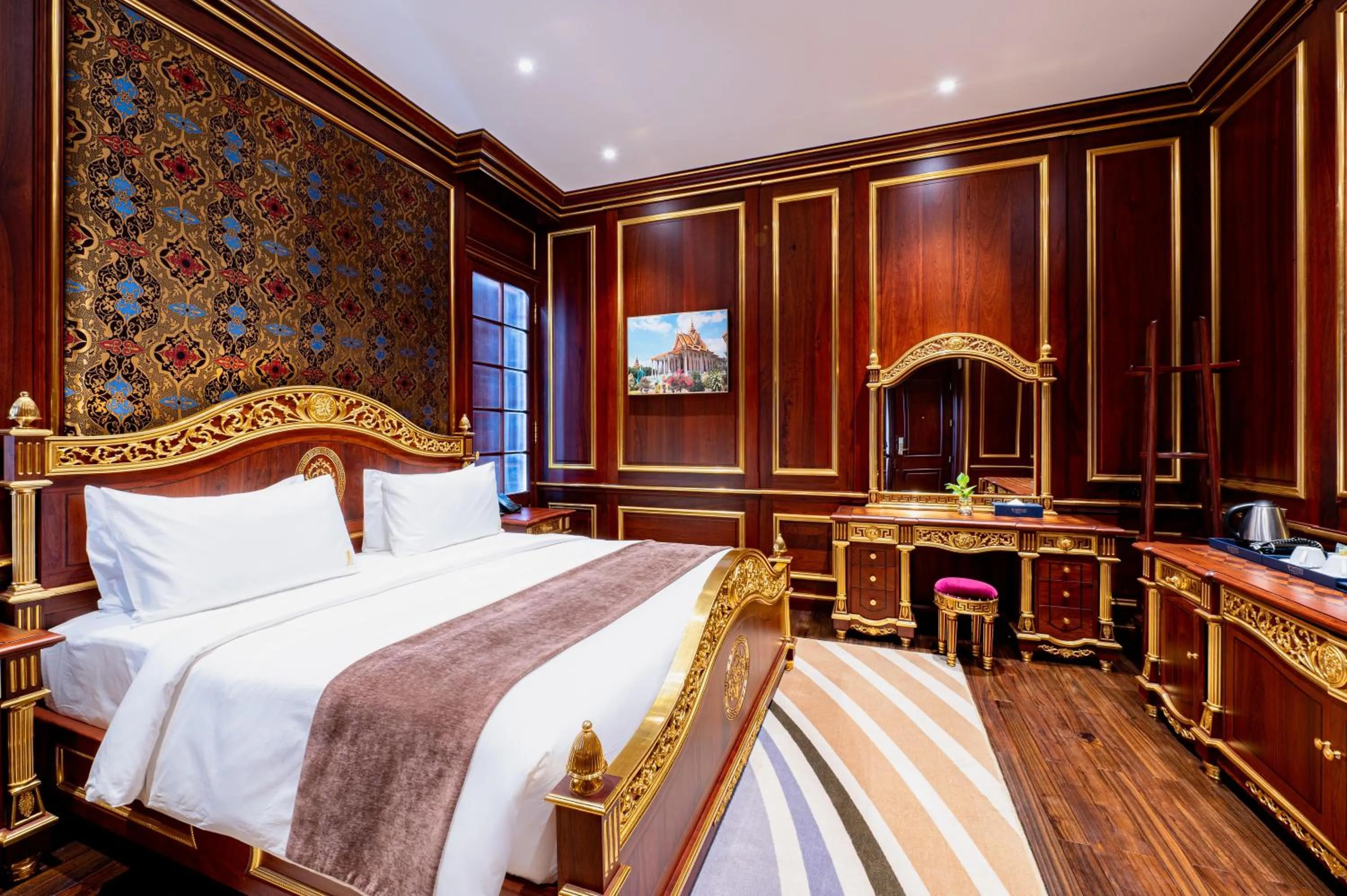 Bed in V V Hotel Battambang