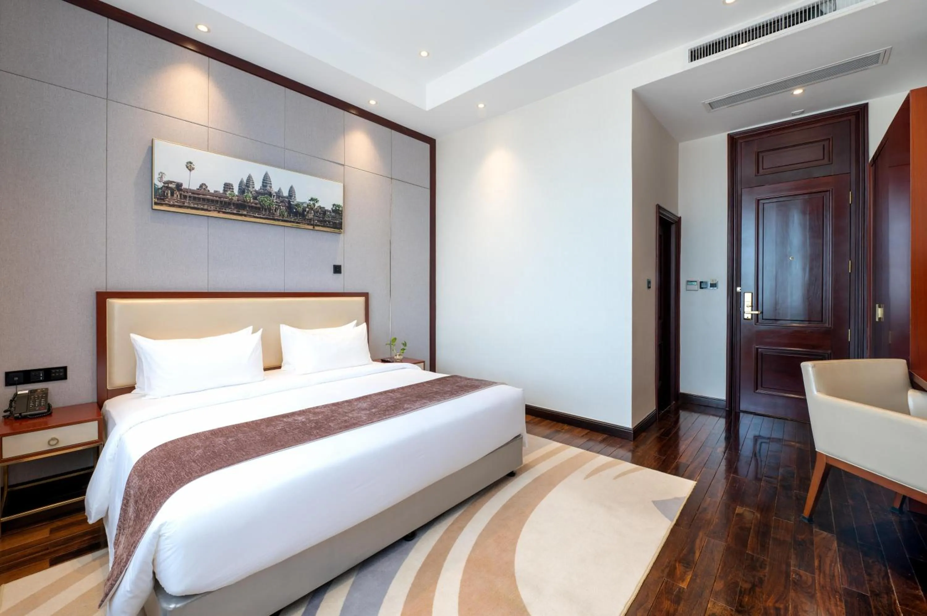 Bed in V V Hotel Battambang