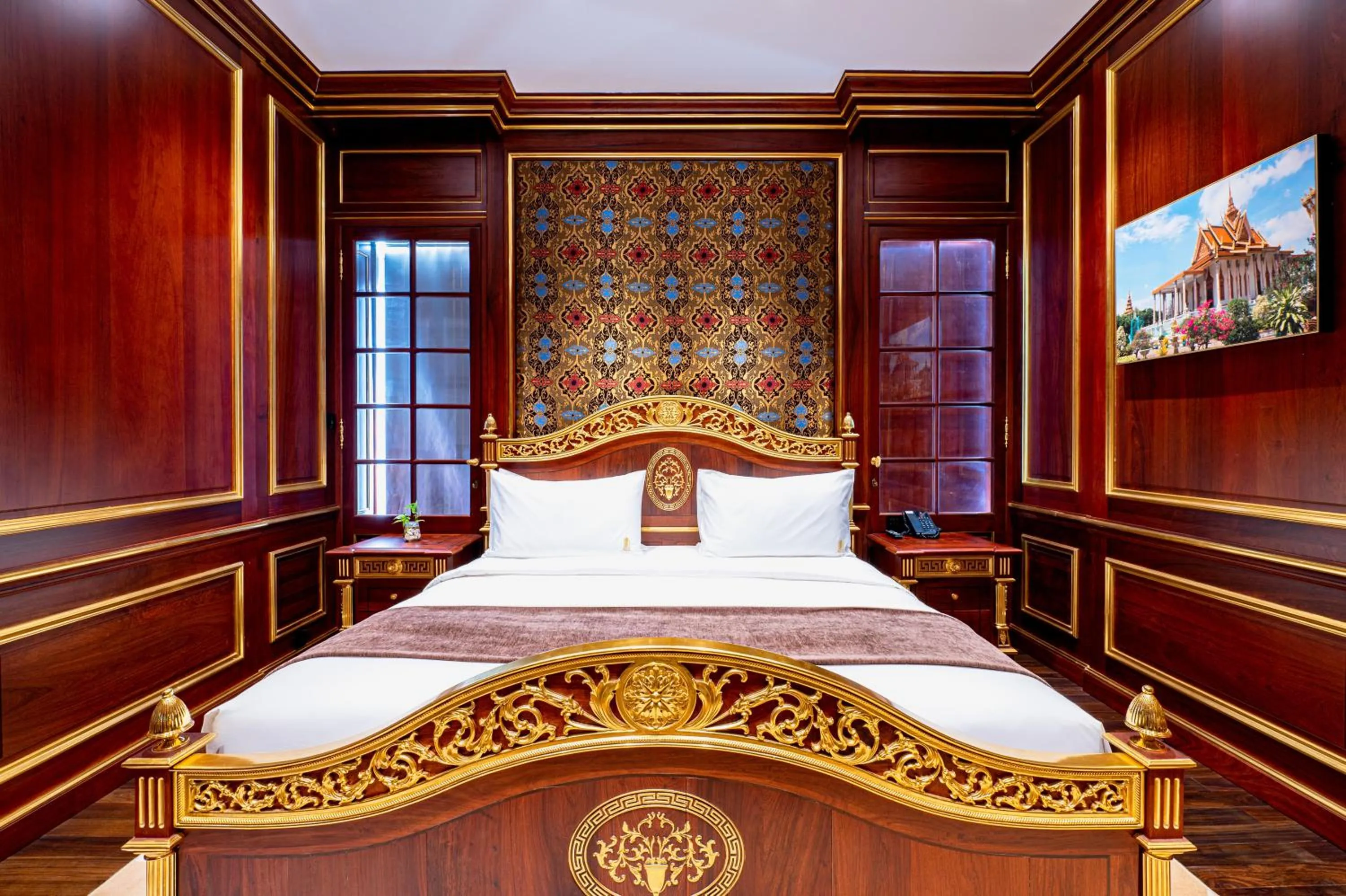 Bed in V V Hotel Battambang