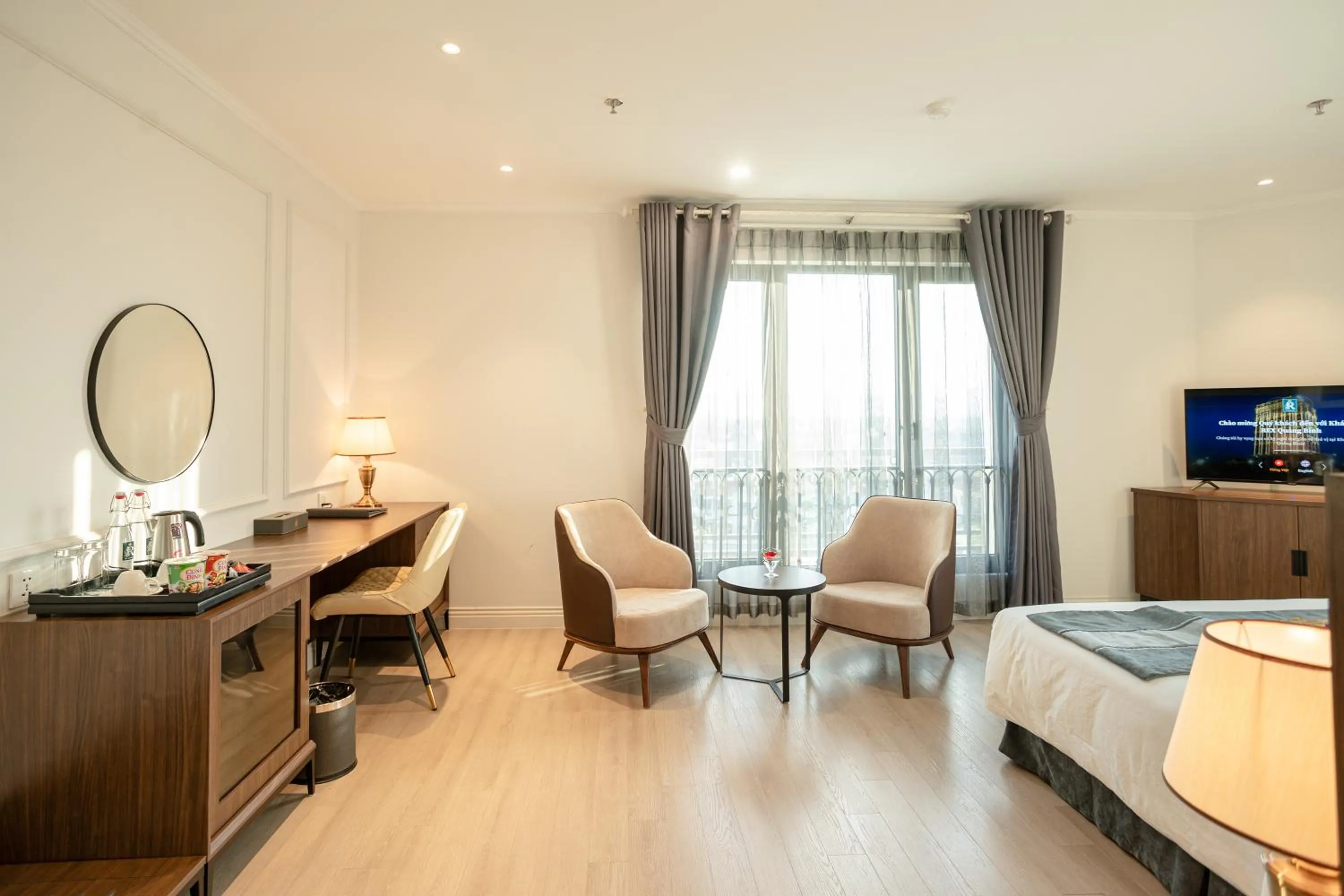 Seating area, Bed in Rex Quang Binh Hotel