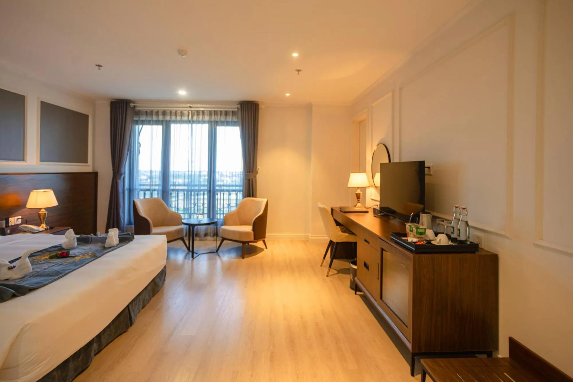 Living room, Bed in Rex Quang Binh Hotel