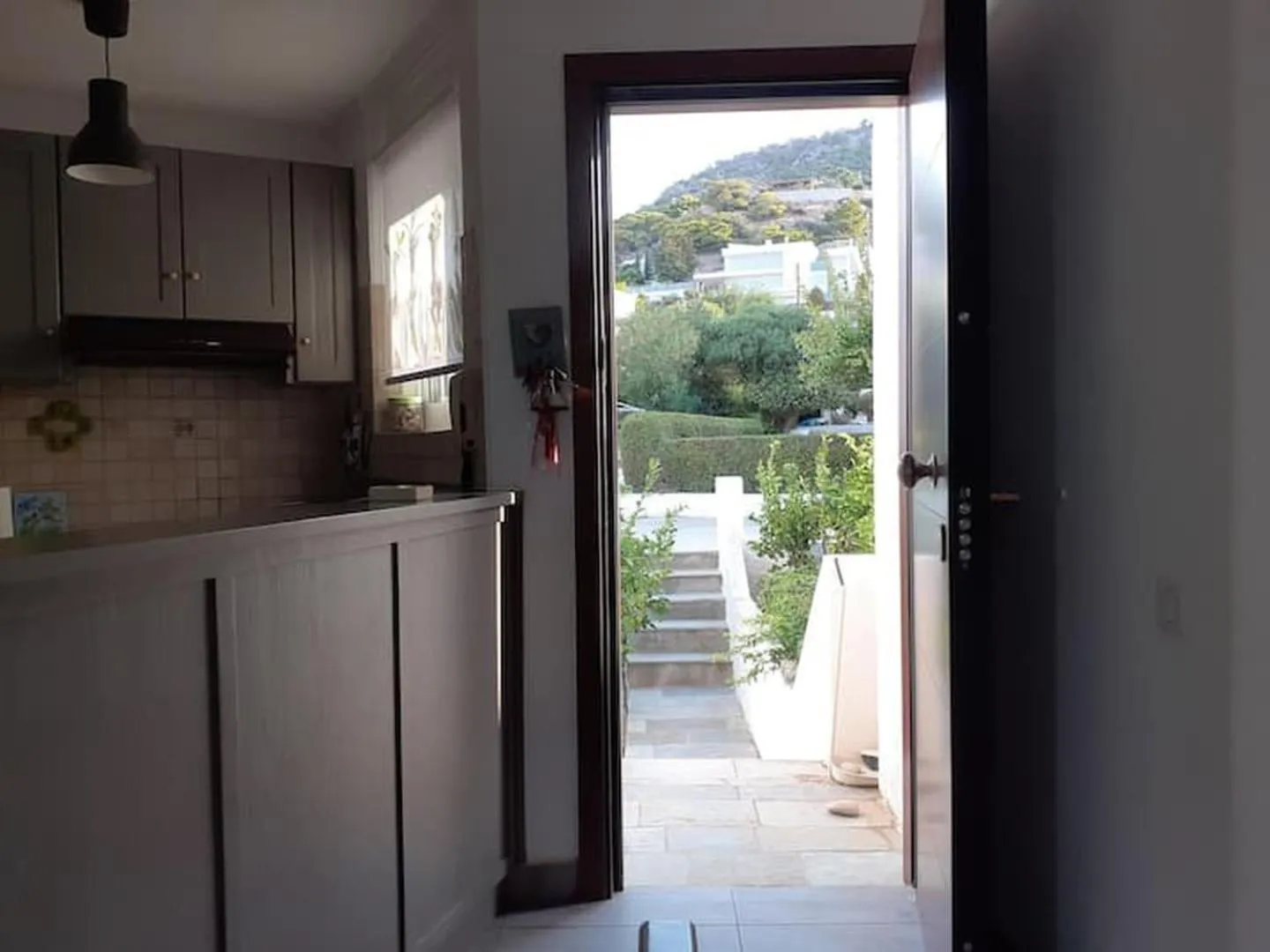 Facade/entrance in Breezy summer maisonette with exciting view!
