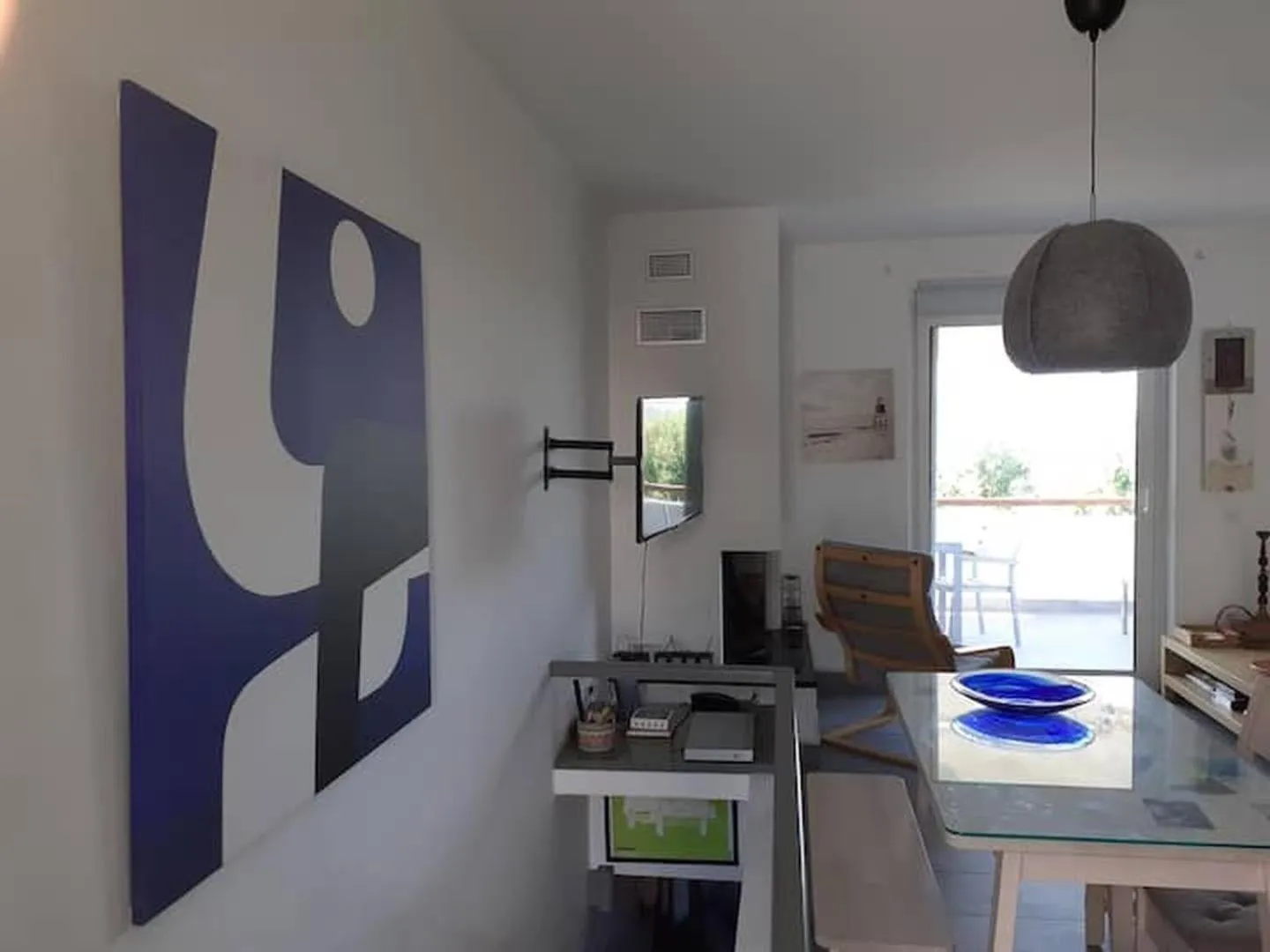 TV and multimedia in Breezy summer maisonette with exciting view!