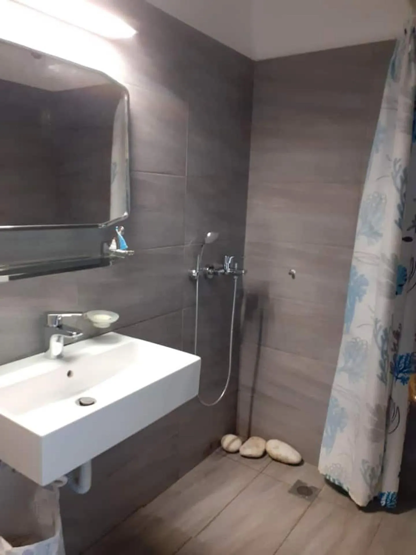 Bathroom in Breezy summer maisonette with exciting view!