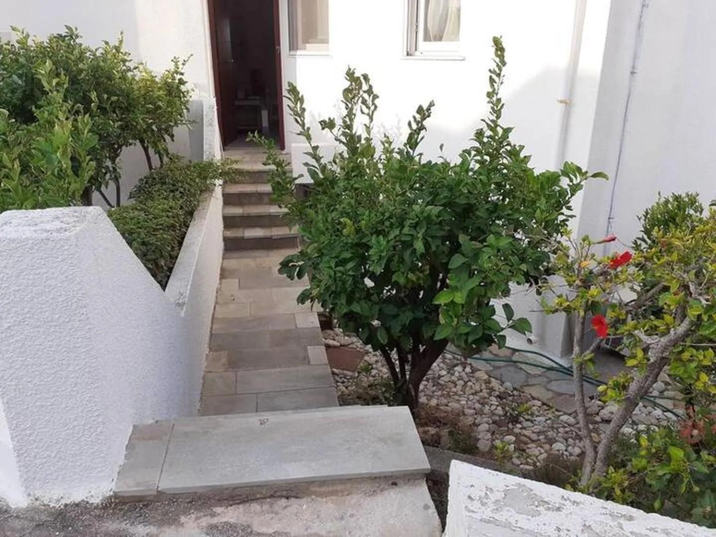 Facade/entrance in Breezy summer maisonette with exciting view!