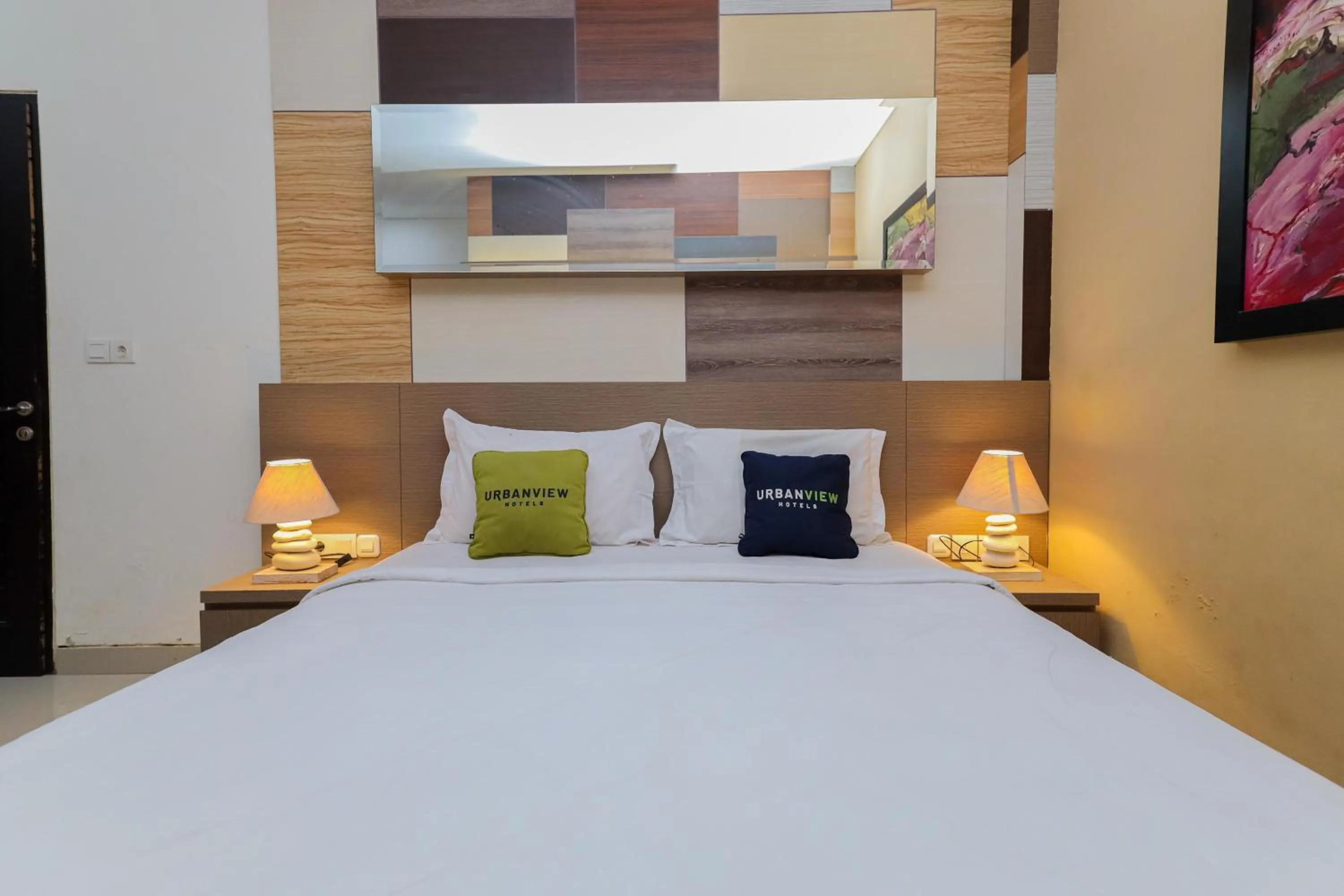 Bedroom, Bed in Urbanview Hotel WG Jimbaran Bali