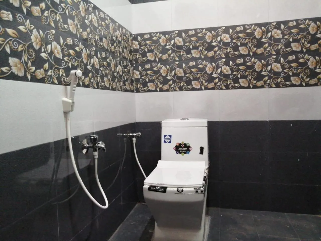 Bathroom in Le Springlynn Residency