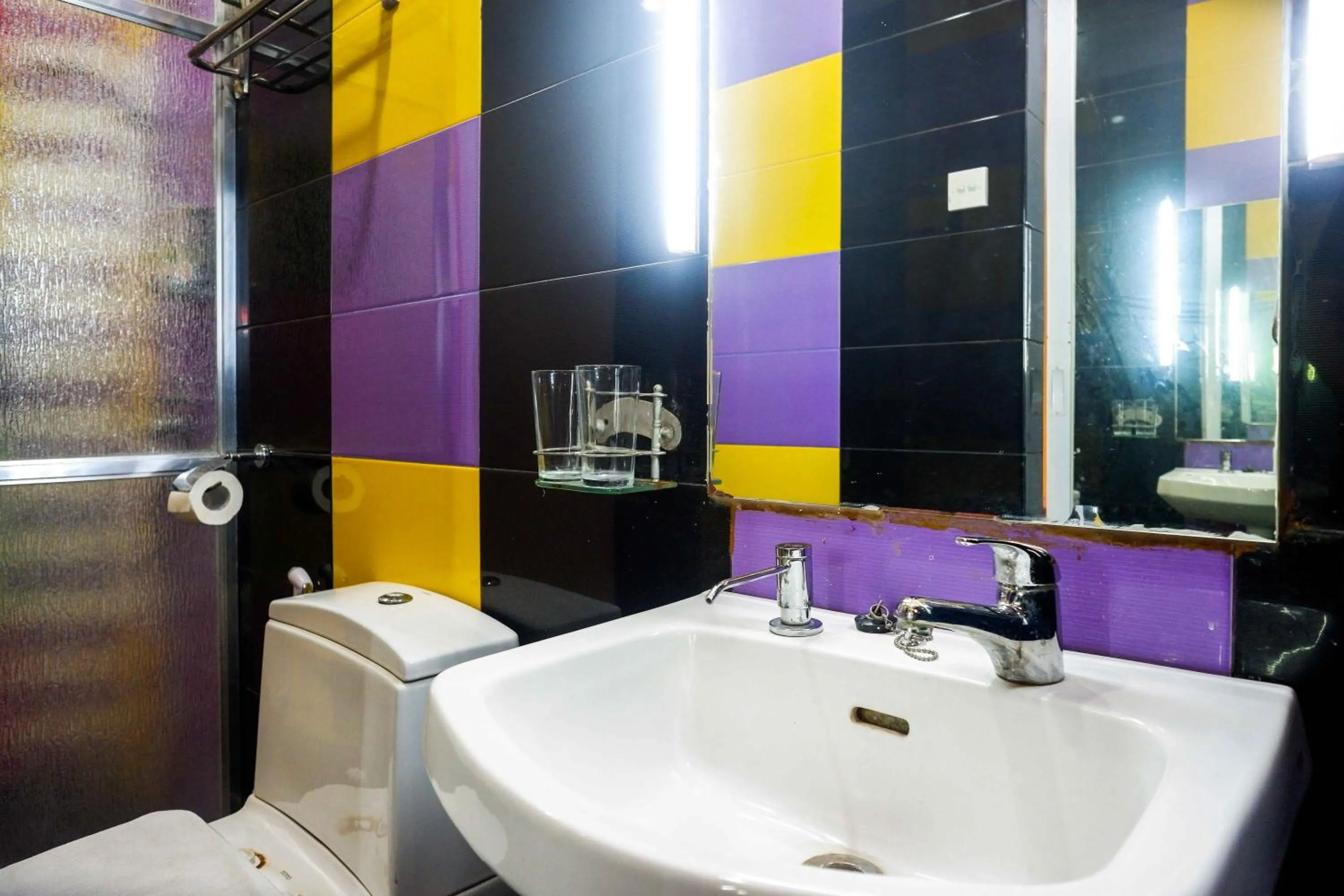 Bathroom in Sans Hotel International Surabaya
