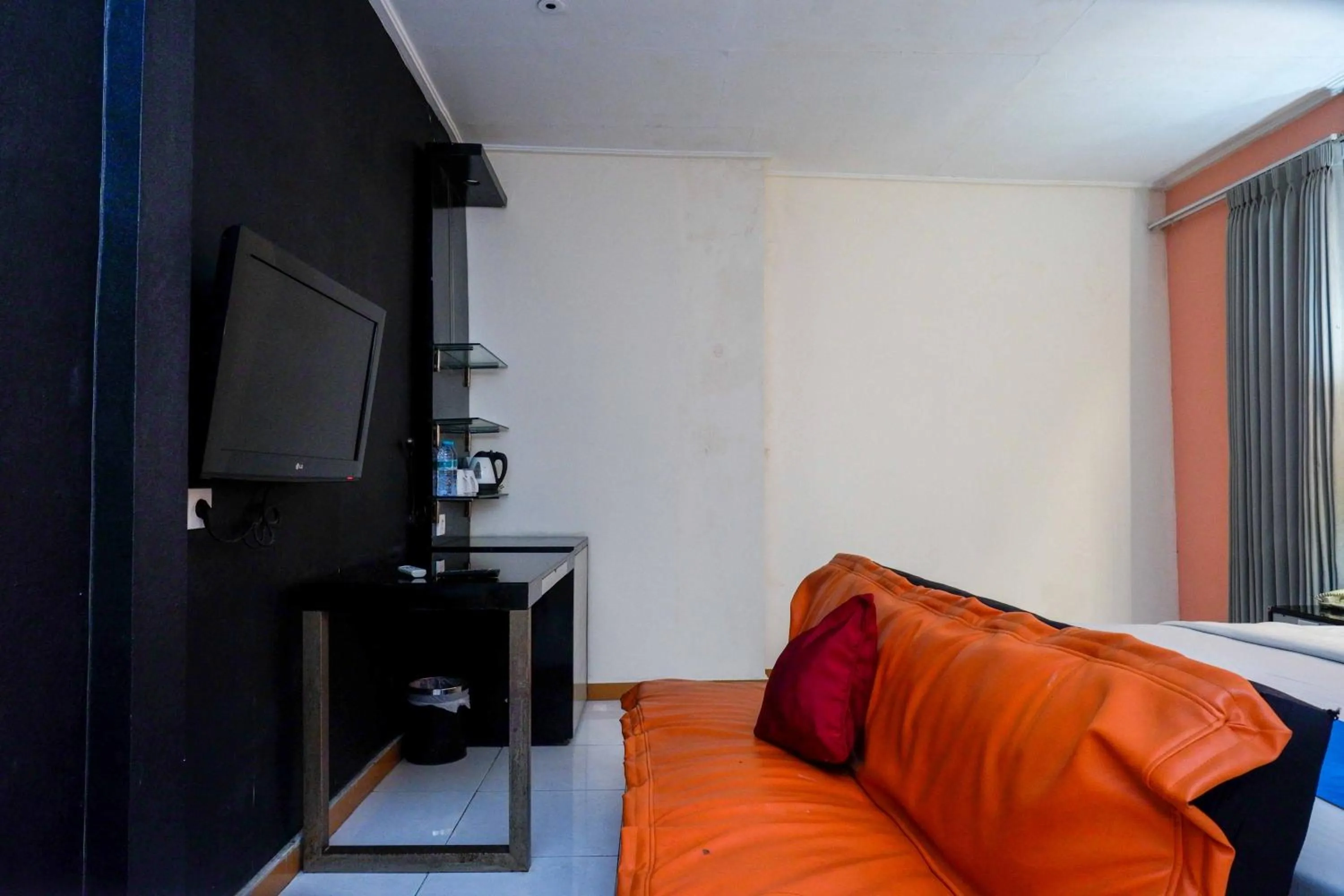 Bedroom in Sans Hotel International Surabaya