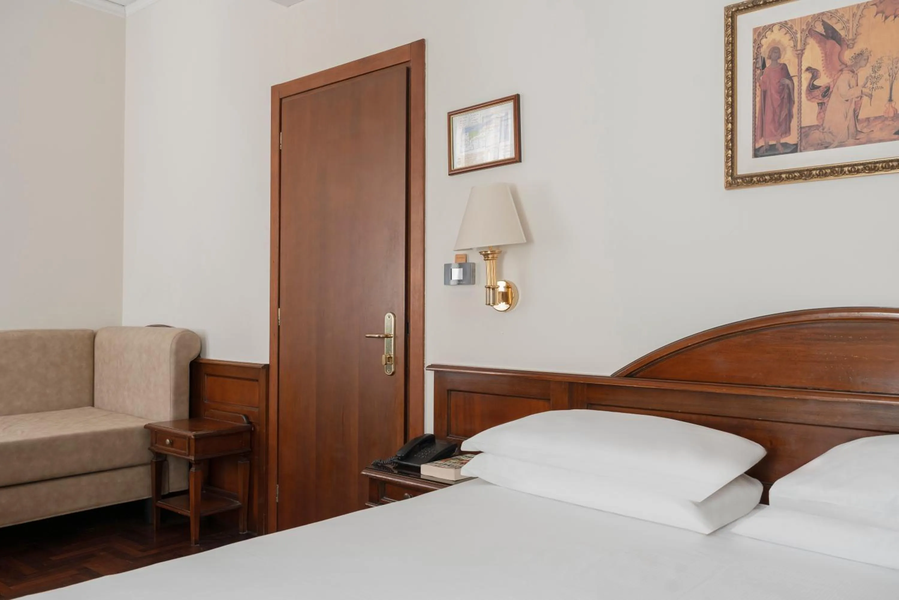 Bed in Hotel Boccaccio