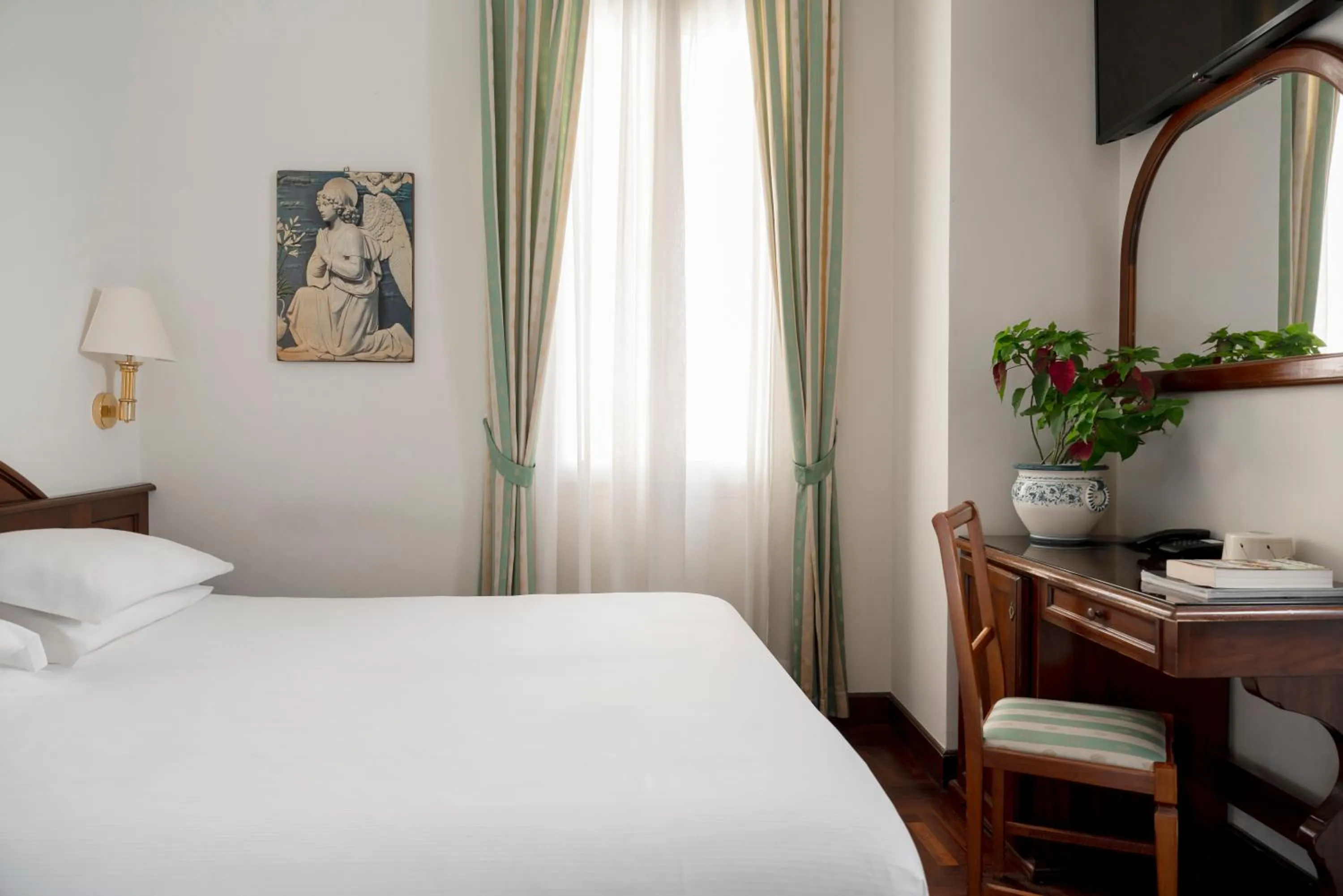 Bed in Hotel Boccaccio