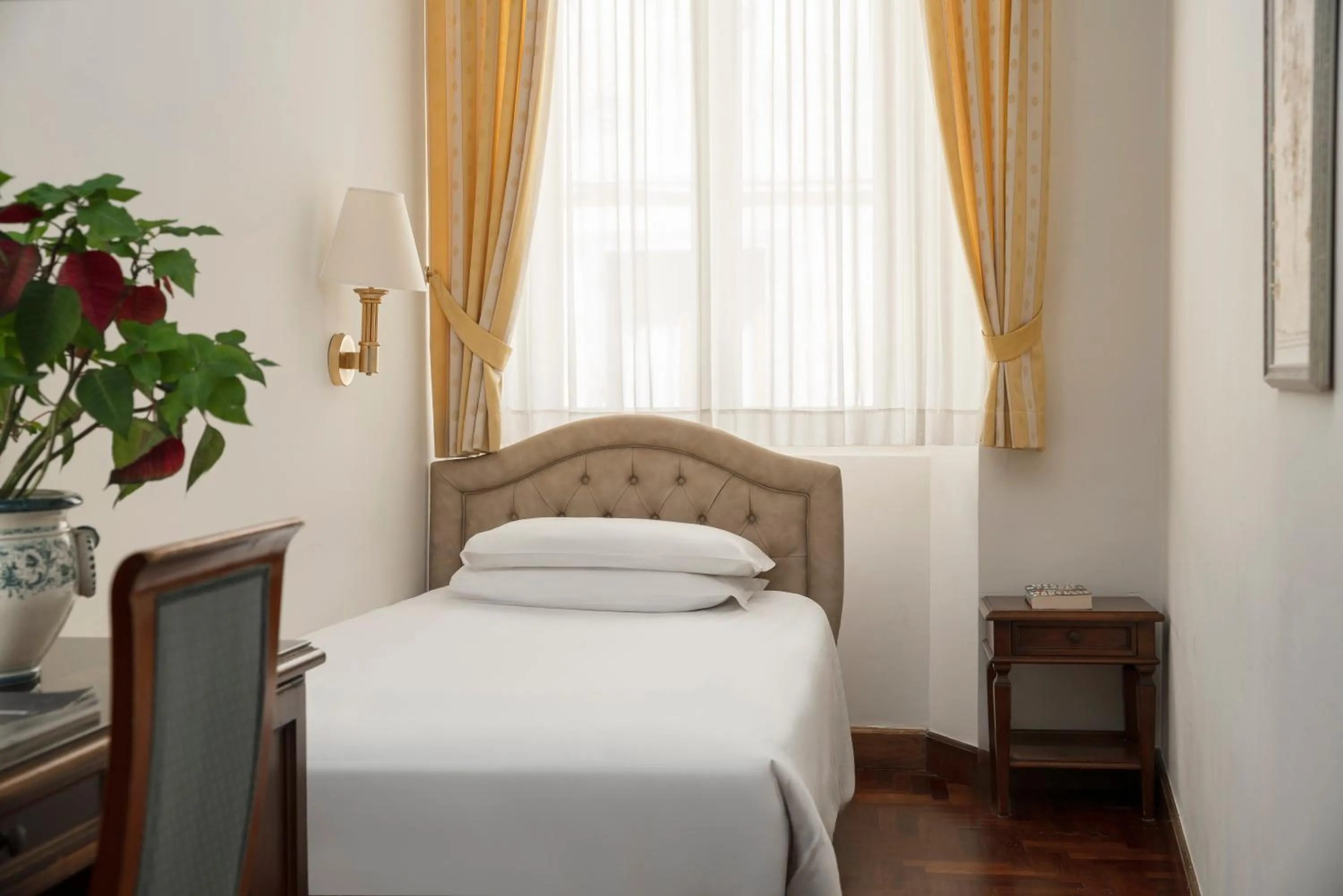 Bed in Hotel Boccaccio
