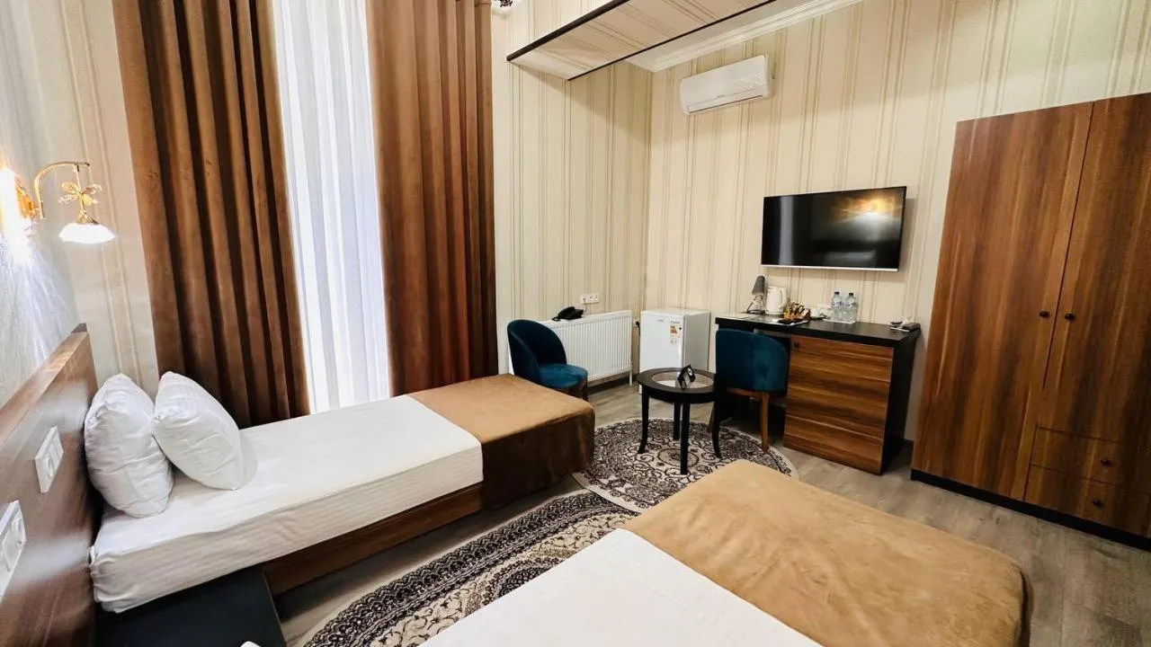 TV and multimedia, Bed in Garden Plaza Bukhara