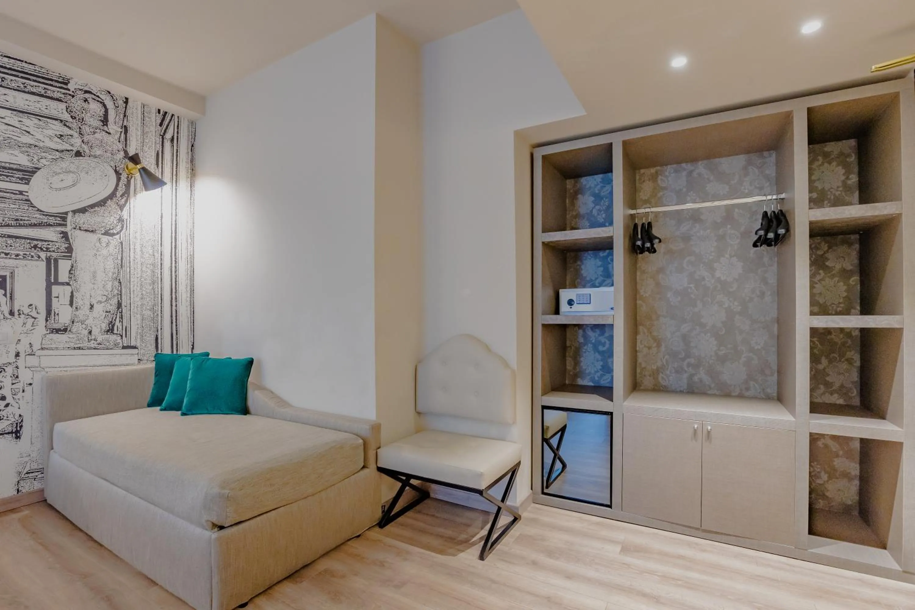 Seating area, Bed in FH55 Grand Hotel Mediterraneo