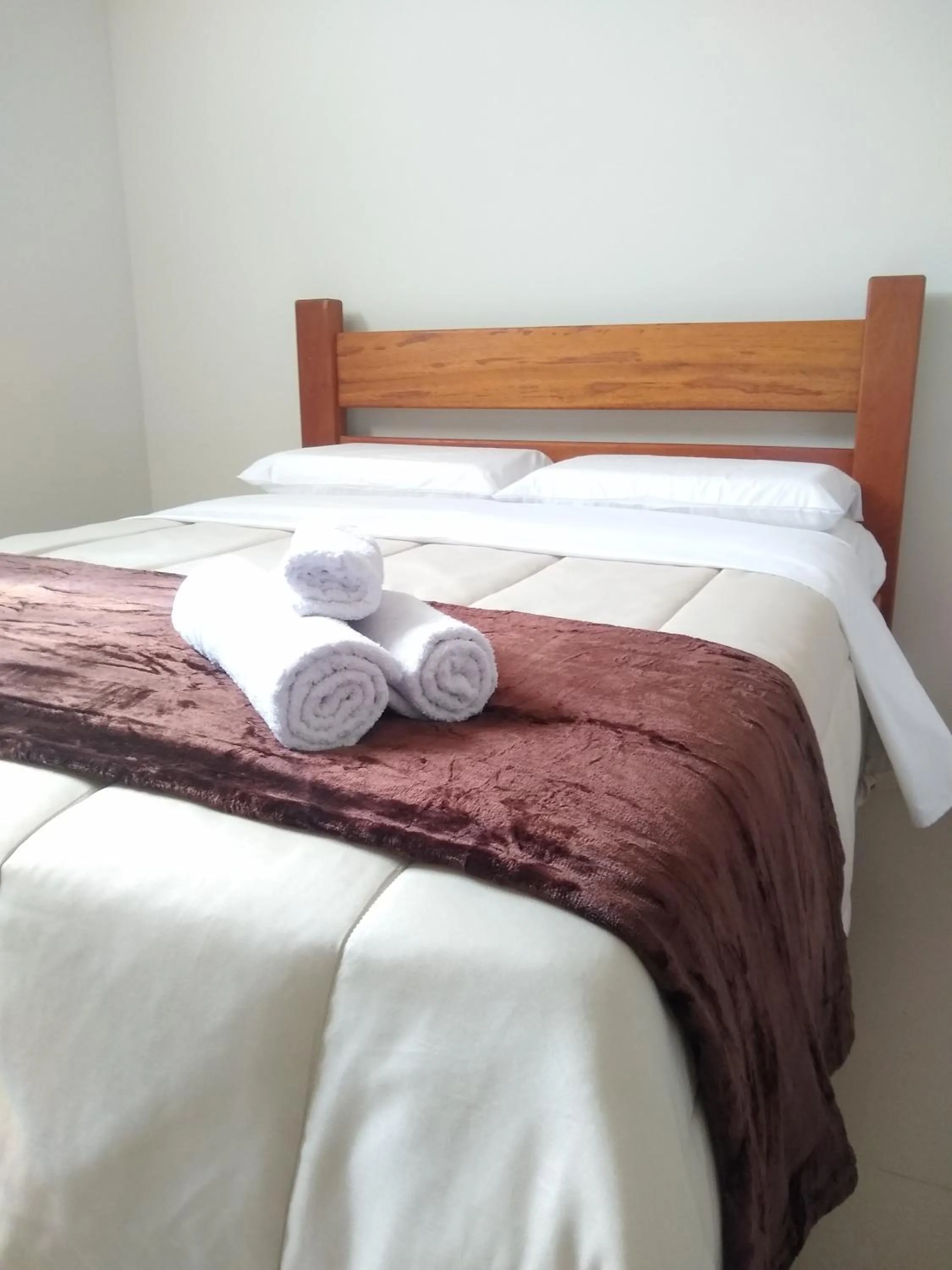 Bed in Santiago Palace Hotel