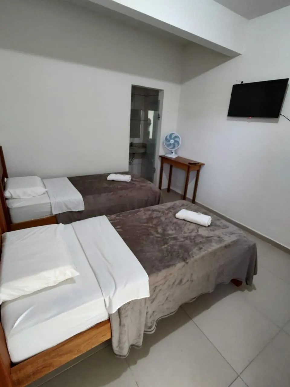 Bed in Santiago Palace Hotel