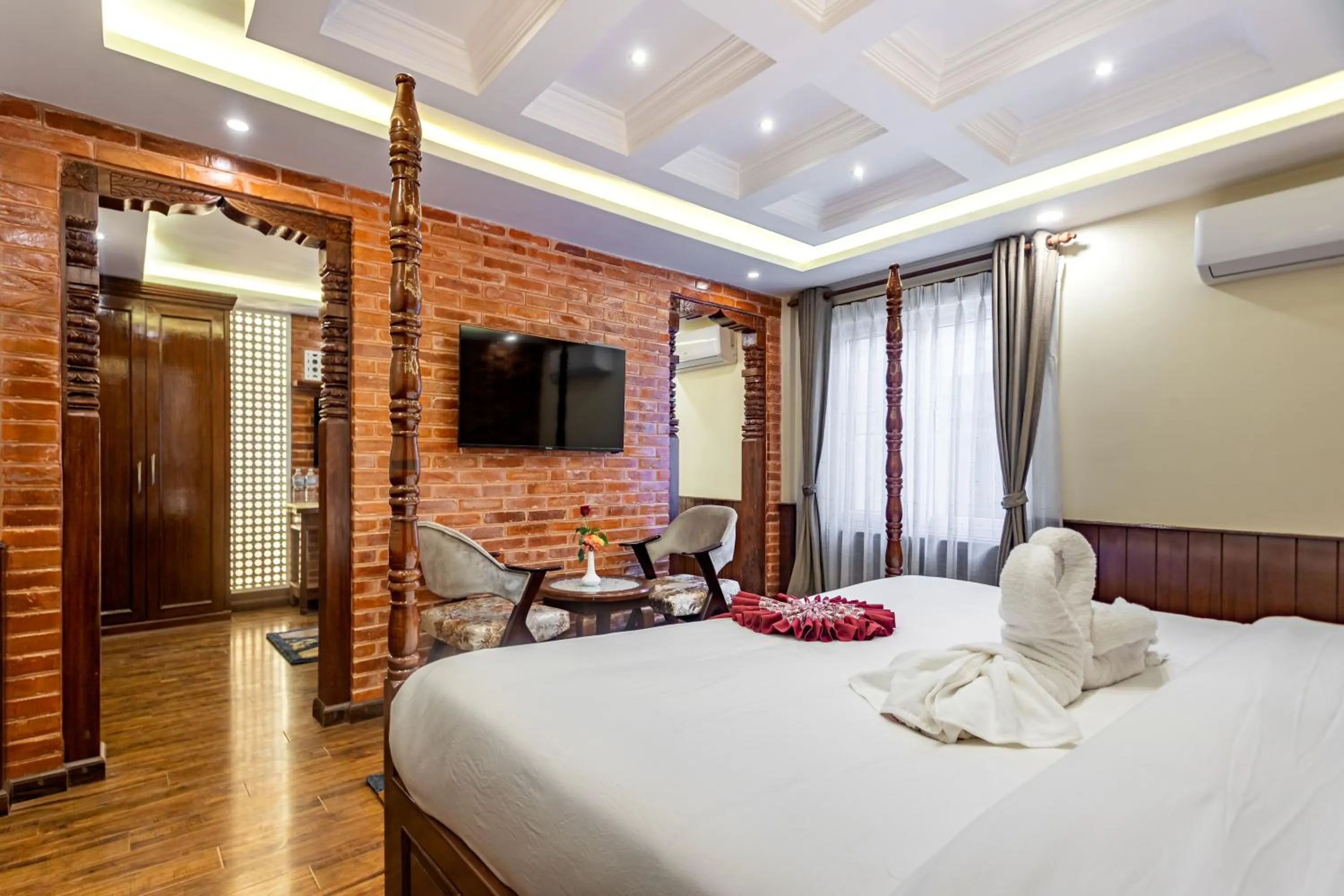 Bed in Amarawati Boutique Hotel