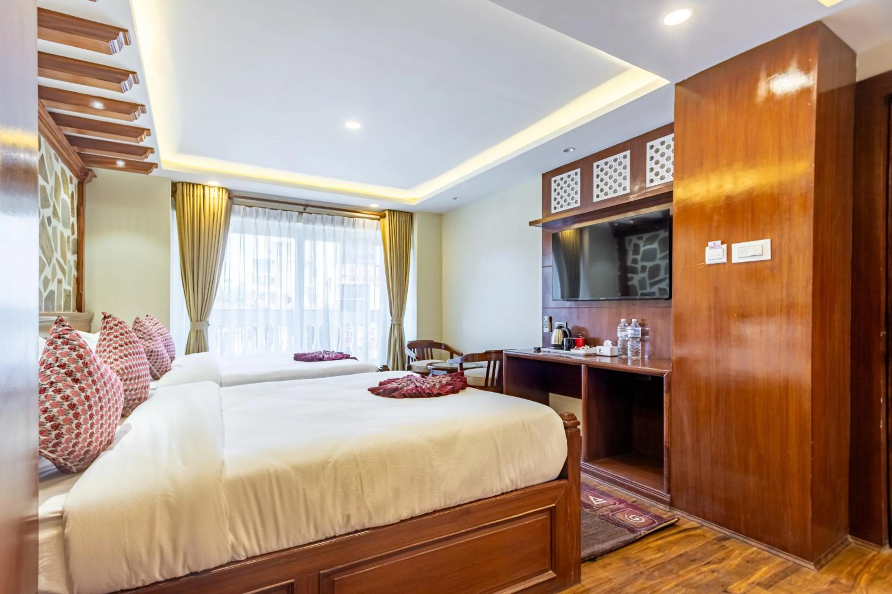 Bed in Amarawati Boutique Hotel