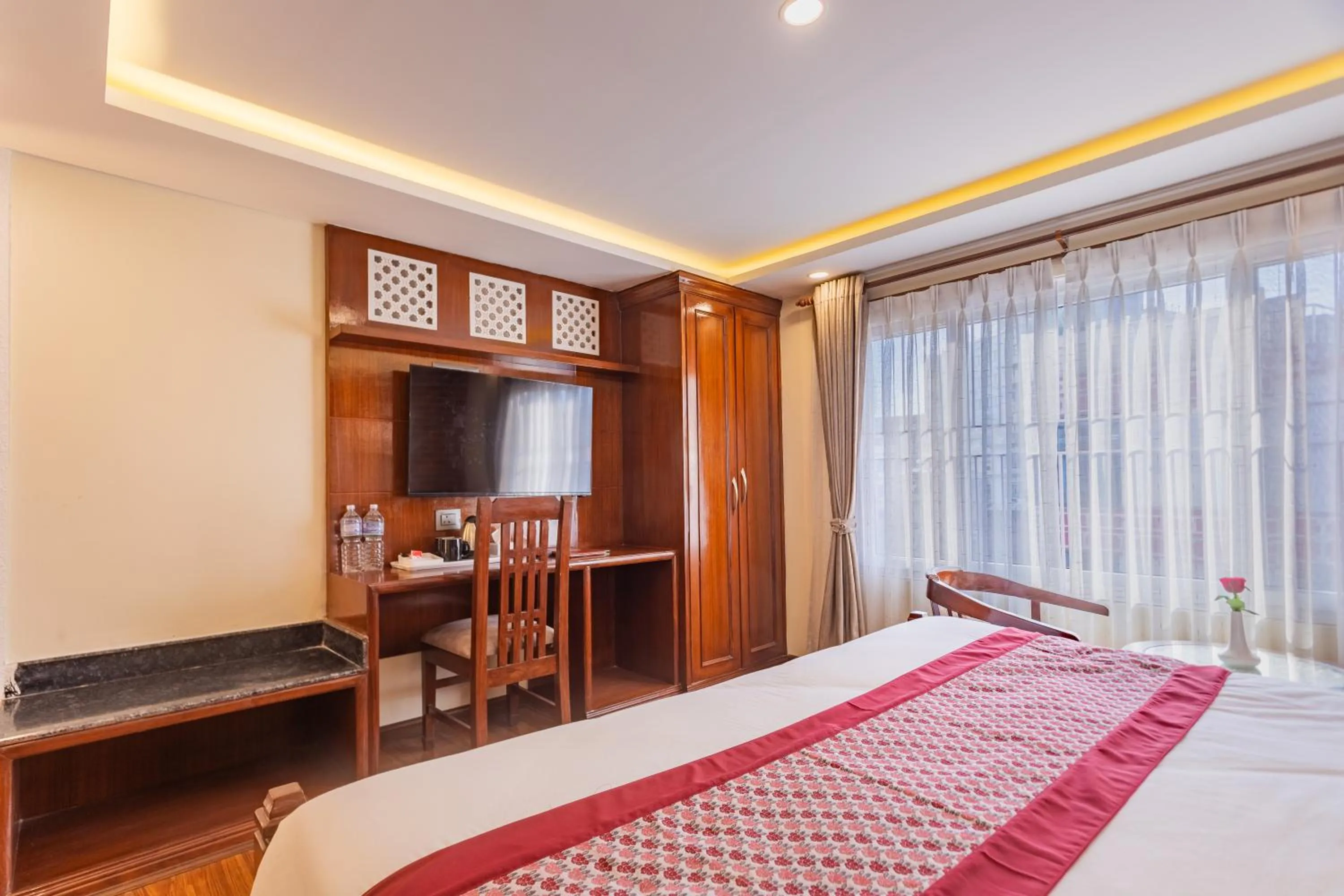 Bed in Amarawati Boutique Hotel