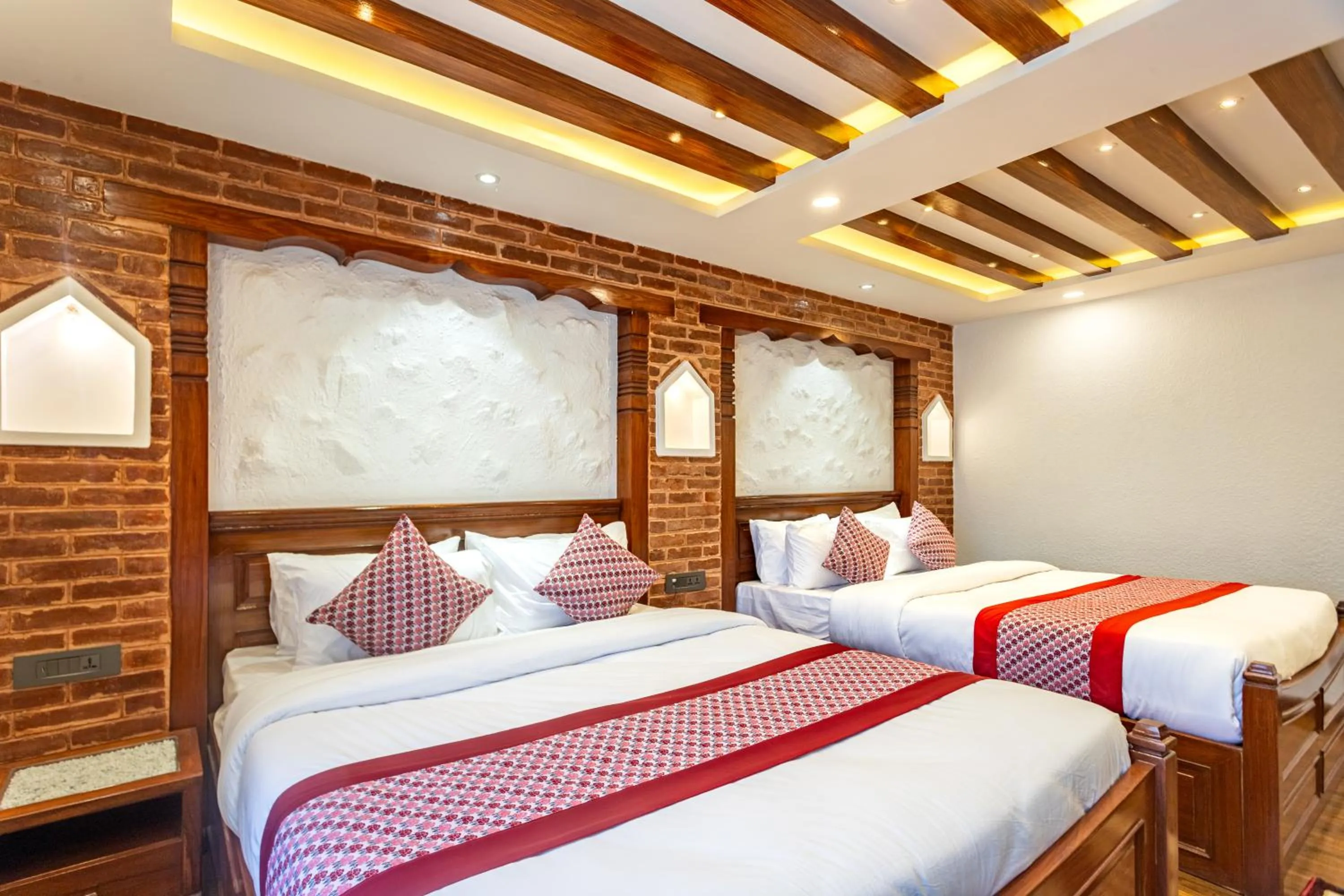 Bed in Amarawati Boutique Hotel
