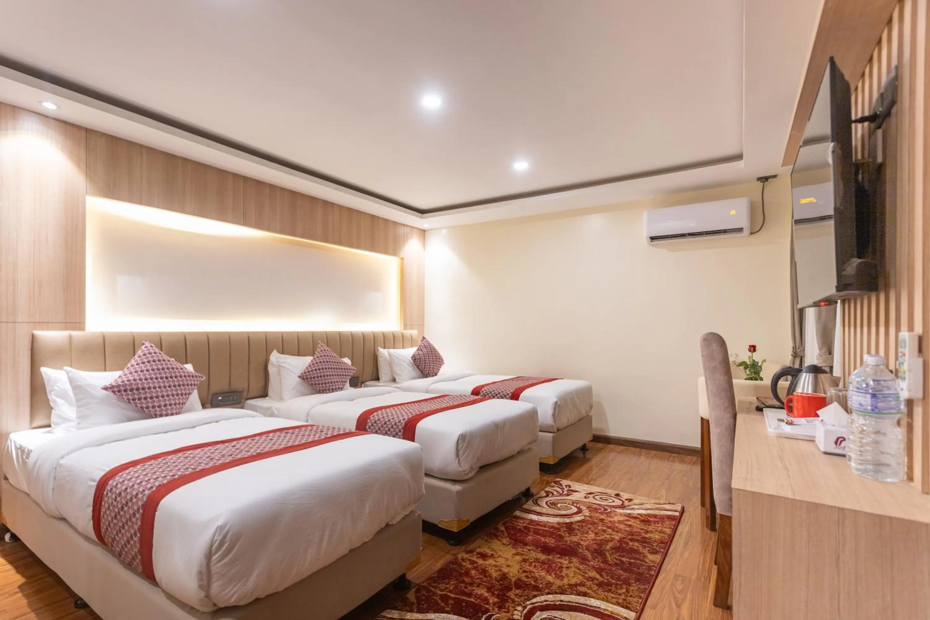 Bed in Amarawati Boutique Hotel